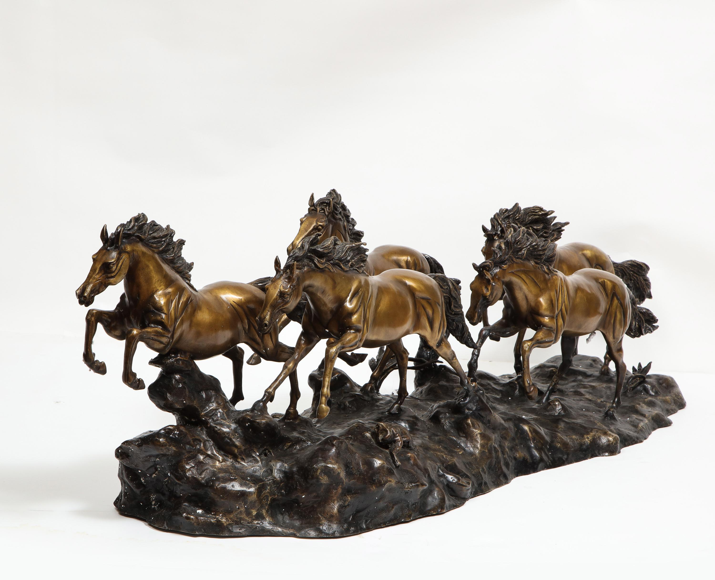 A Massive Patinated Bronze Sculpture of Running Horses 7