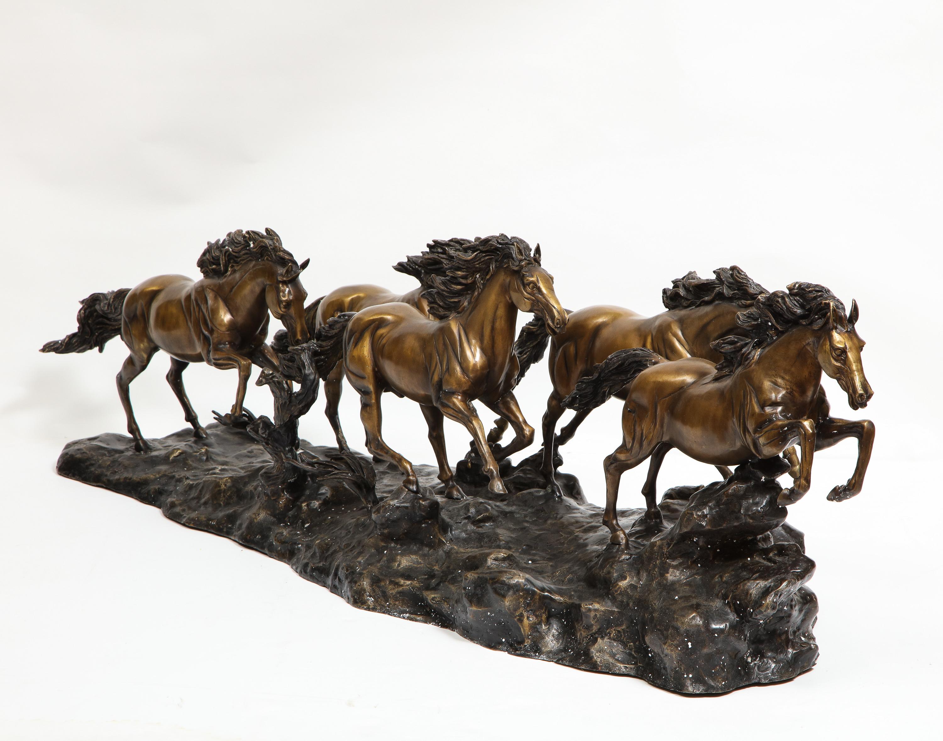 A Massive Patinated Bronze Sculpture of Running Horses 8