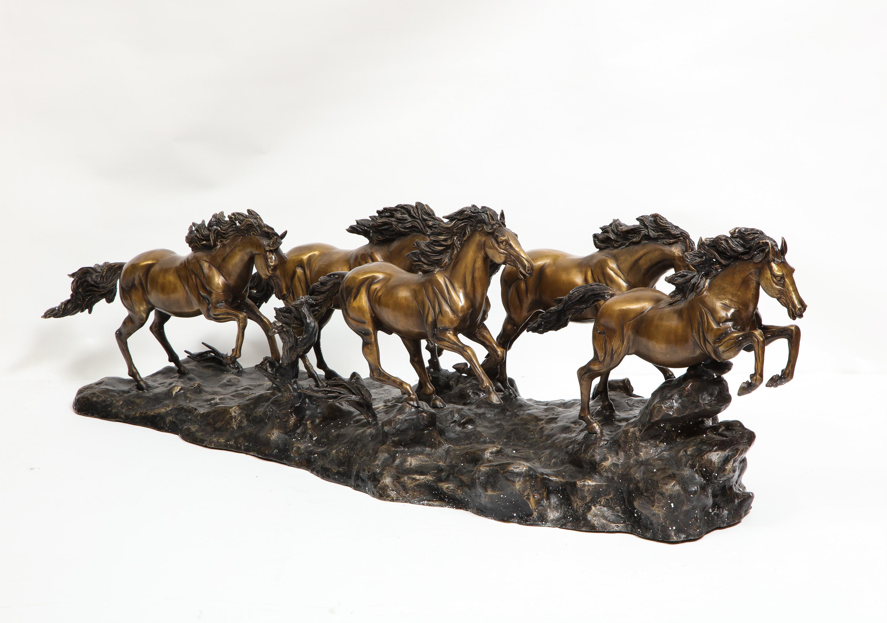 A Massive Patinated Bronze Sculpture of Running Horses 10