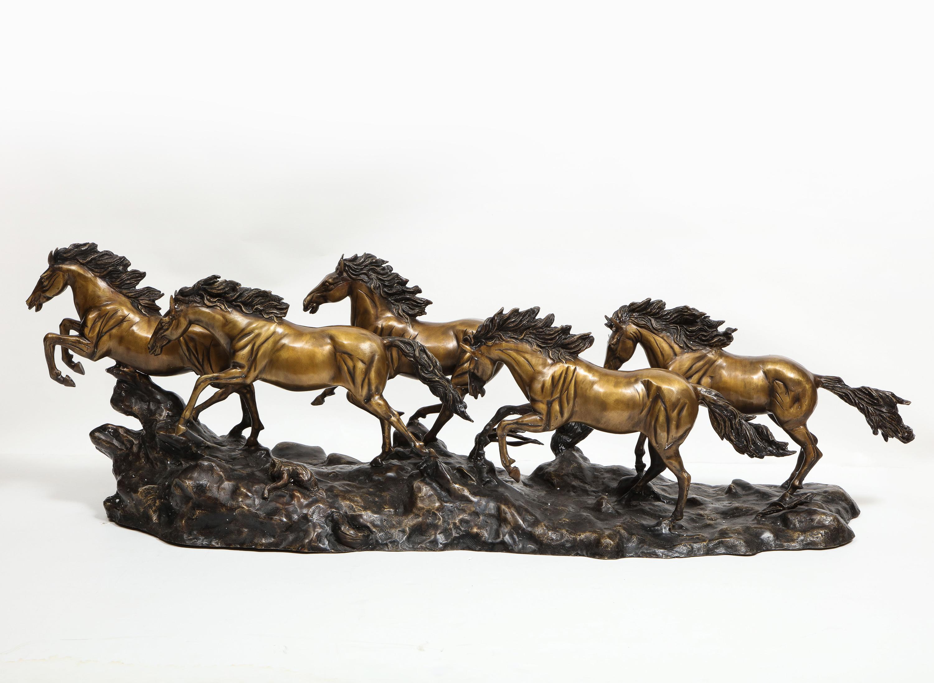 8 running horses statue