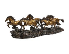 A Massive Patinated Bronze Sculpture of Running Horses