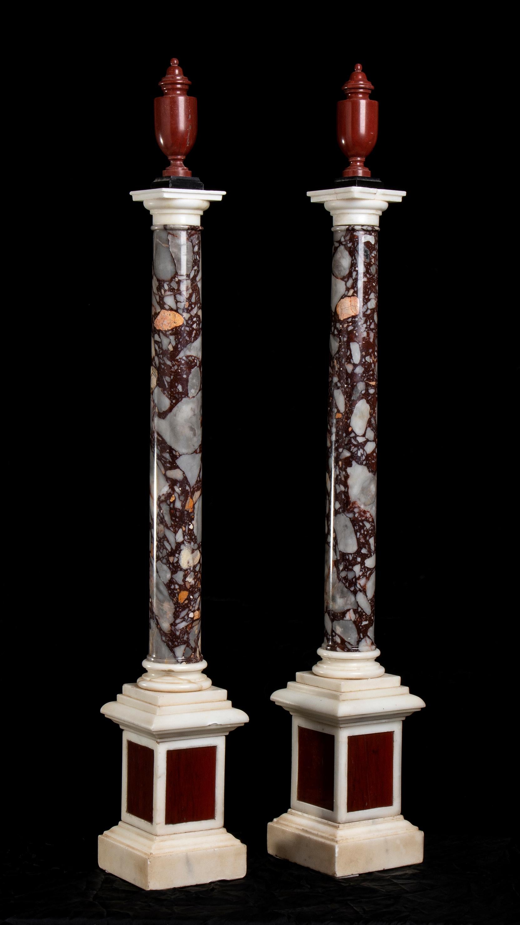 A Pair Of Italian Breccia White and Marble Columns Each Surmounted by an Amphora 1