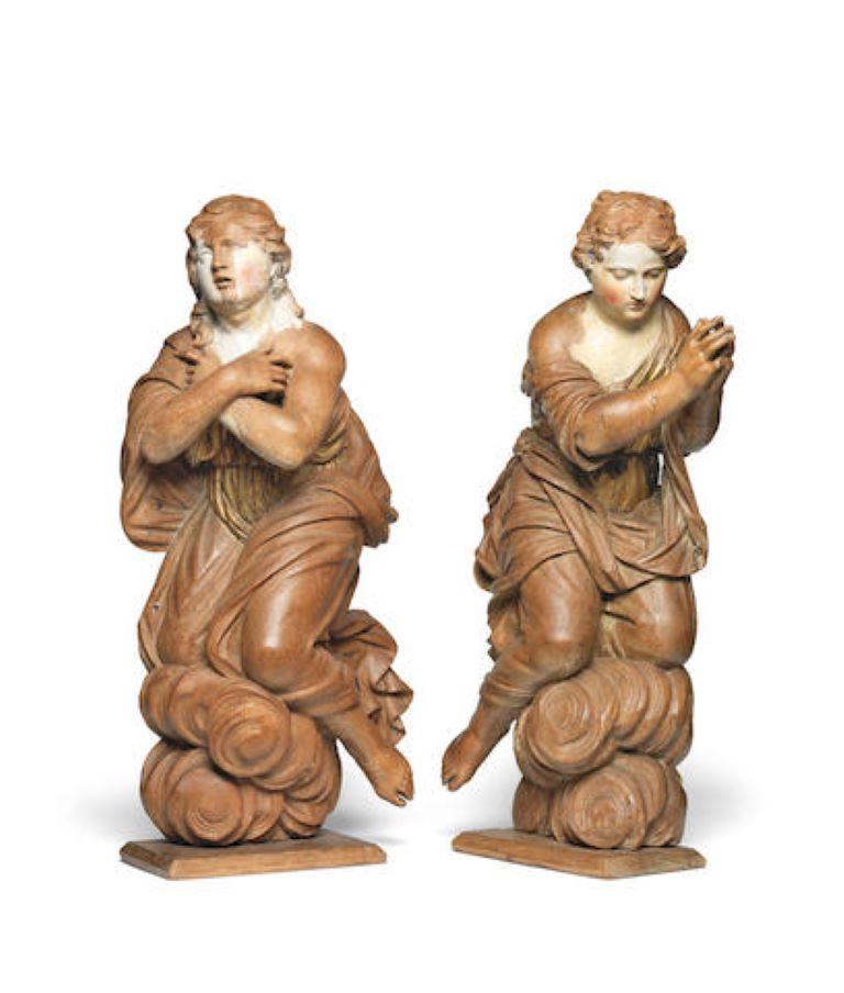 Unknown Figurative Sculpture - A pair of late 17th century Northern European carved oak angels