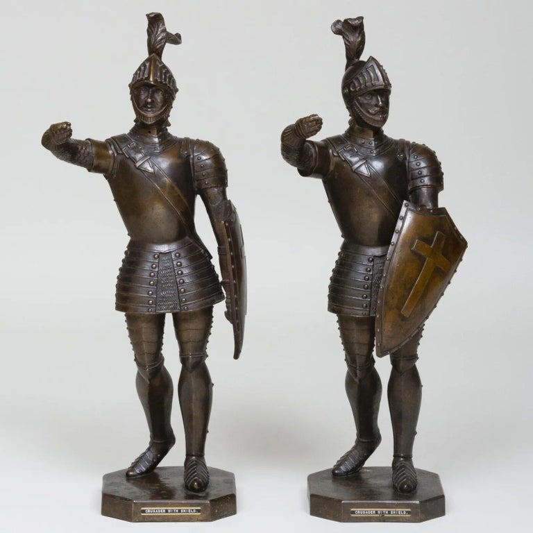A Pair Of Patinated Bronze Medieval Crusader Sculptures with Armor and Shields - Gold Figurative Sculpture by Unknown
