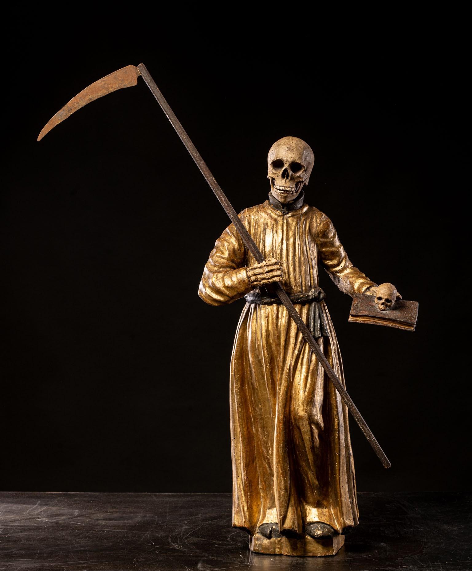 A South German polychromed and gilt wood figure of a Monastic “Poor Soul” (Arme