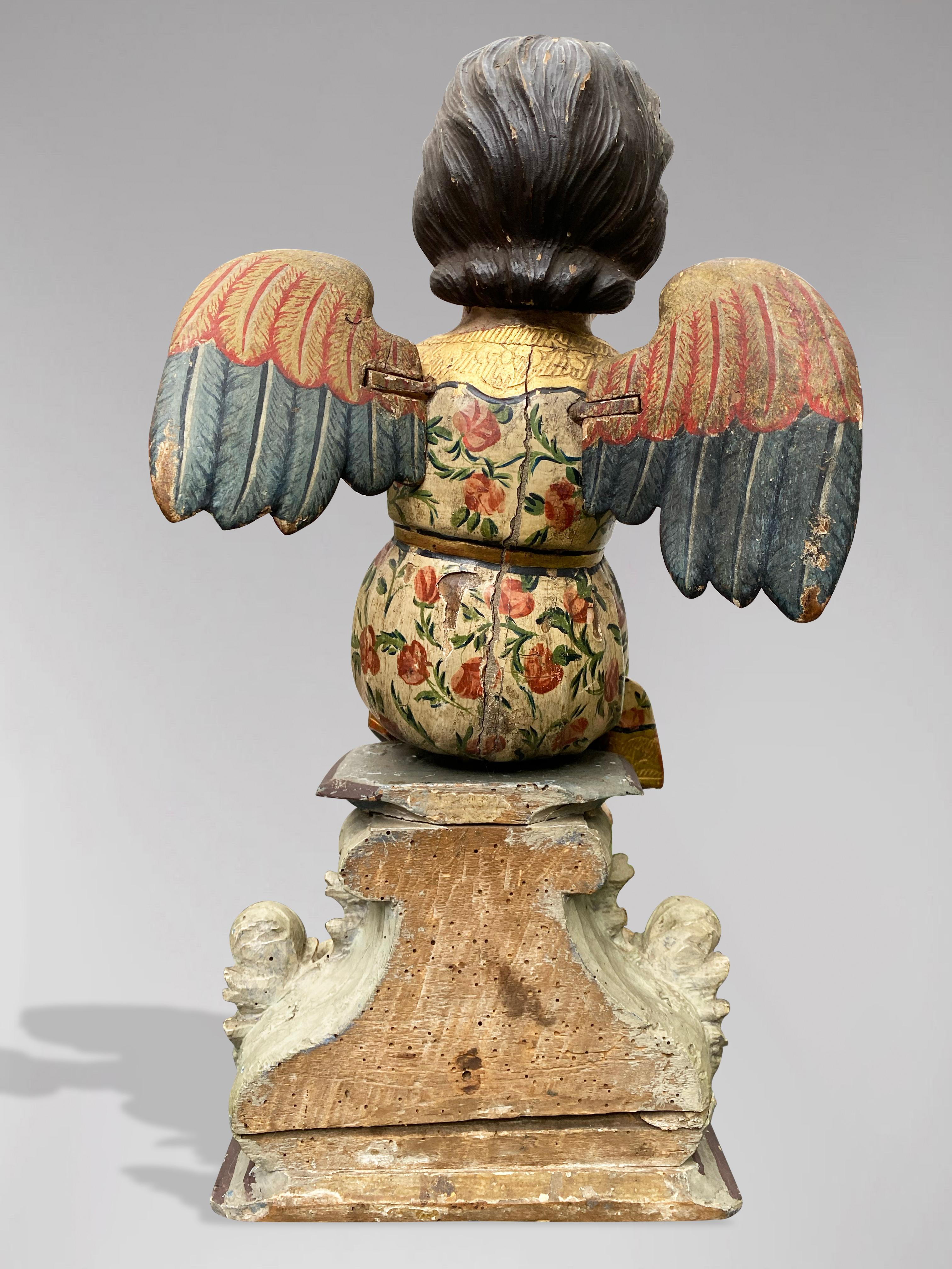 Spanische Statue eines auf einem Pedestal sitzenden Engels mit geöffneten Armen, frühes 19. im Angebot 1