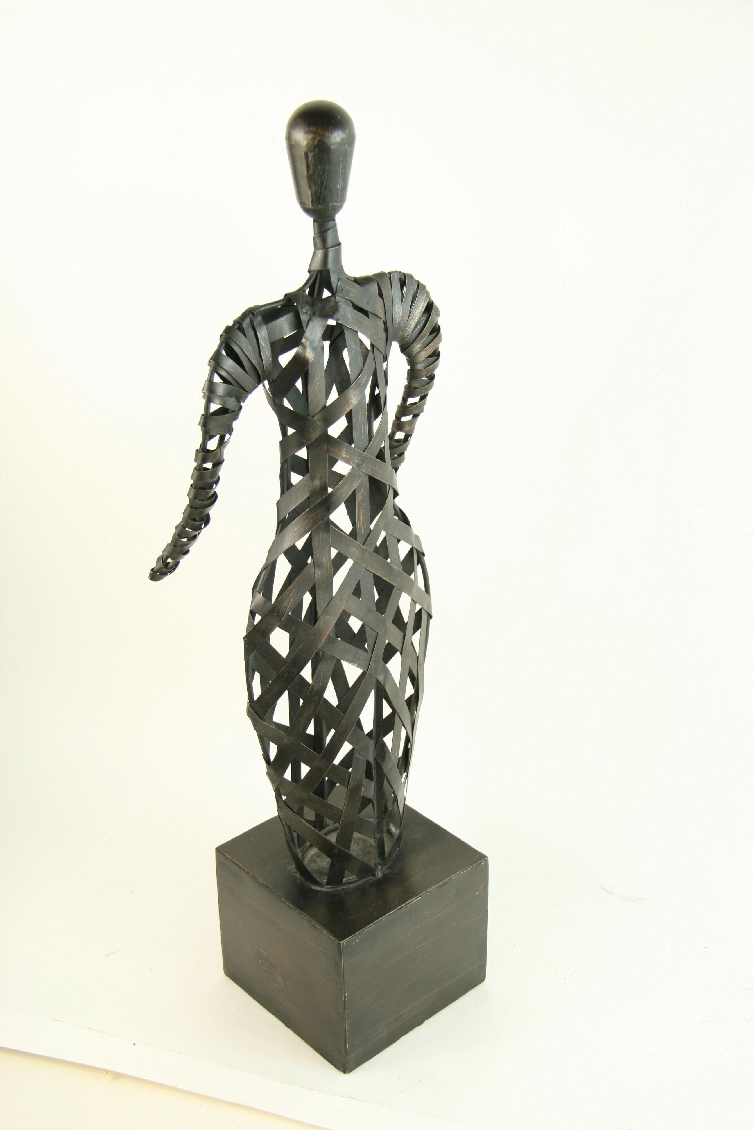 8-217 Abstract figural sculpture made from metal straps