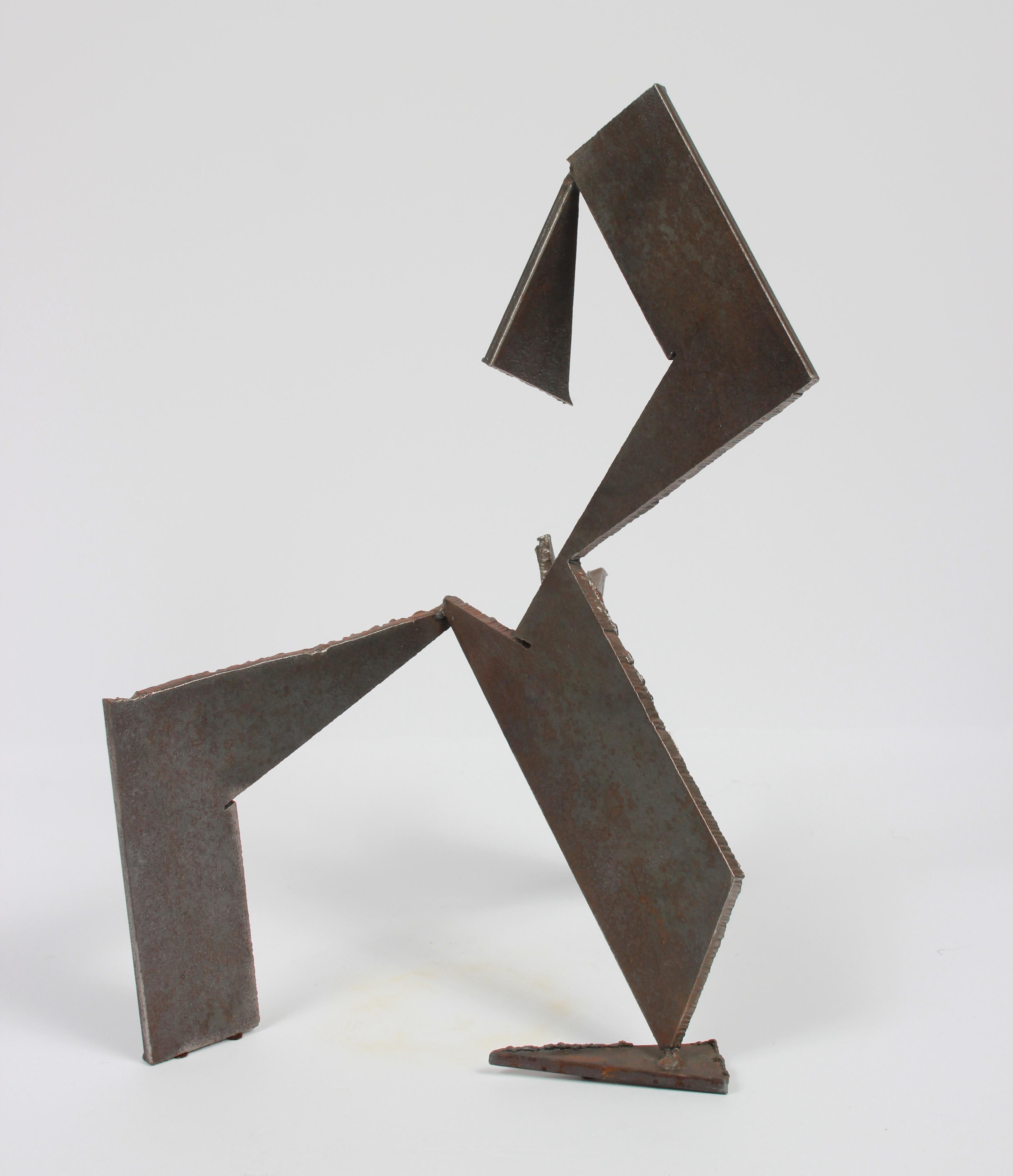 This late 20th century welded steel geometric sculpture stands on its own and is signed by the artist, 