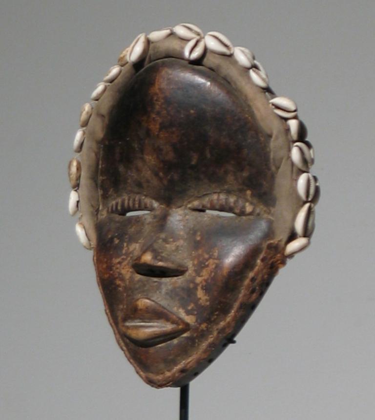 African Dan Mask (Female) - Sculpture by Unknown