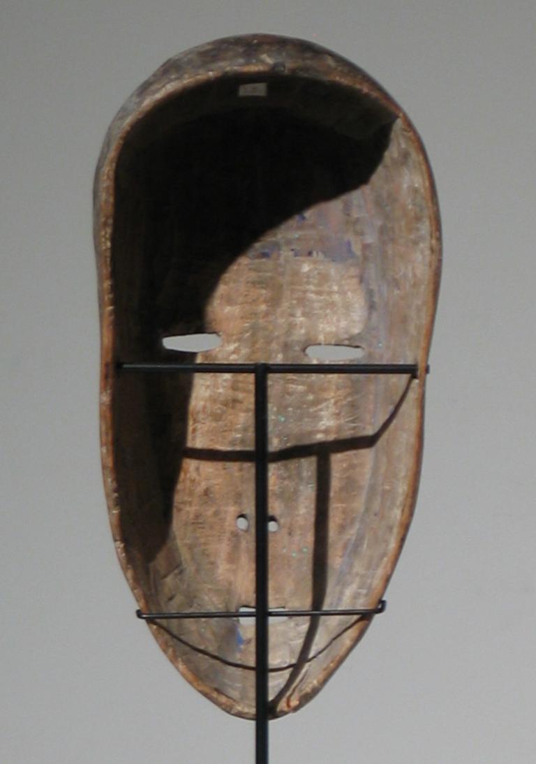African Lega Mask - Brown Figurative Sculpture by Unknown