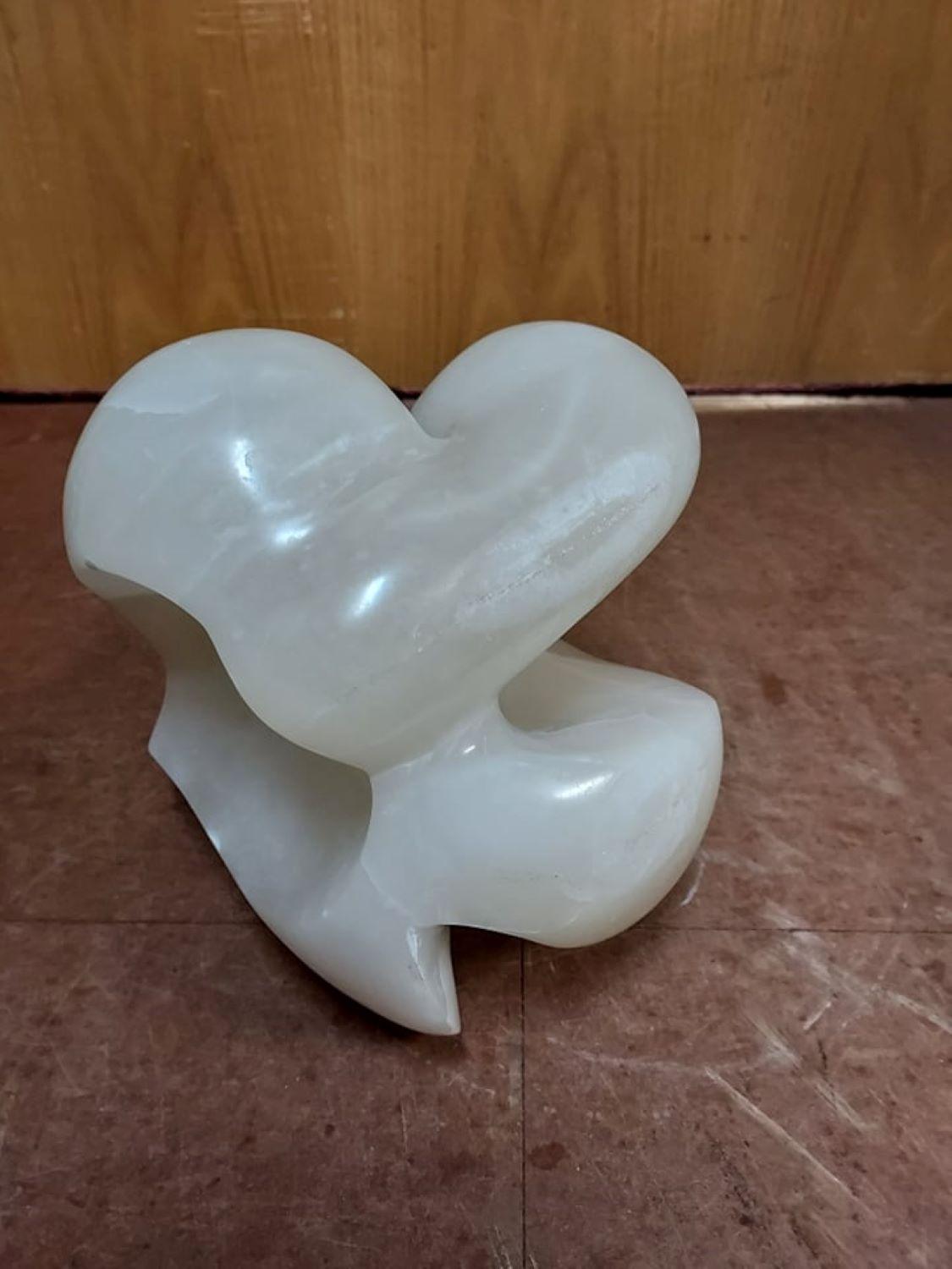 Alabaster Sculpture
Italian Alabaster is a pleasure to work with. Carved thinly, the translucency of the stone allows light to show the beauty of the material said the artist DeanMars 
