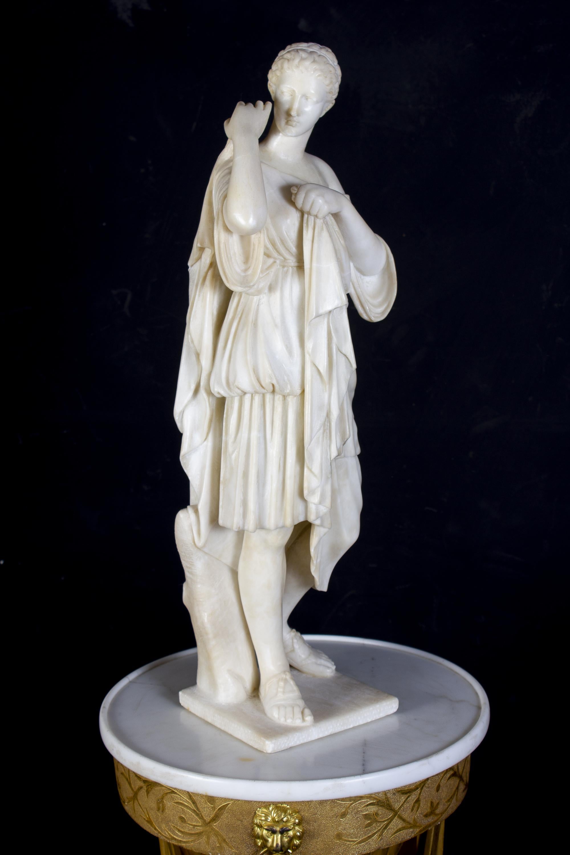  
The sculpture is a marble representation of a draped Vestal Virgin, the priestesses of Vesta, goddess of hearth and home, whose duty it was to keep a sacred fire burning in her temple in Ancient Rome.