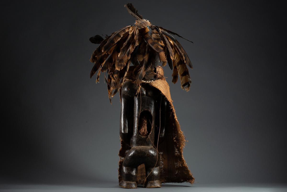 Tribes Ambete Reliquary Figure with Feathers by The Listenbee Collection

Gabon Early 20th century wood, feathers, fabric, ivory, copper, & string 34 Inches

Each piece of tribal art is hand carved, passed down from generation to generation, and is