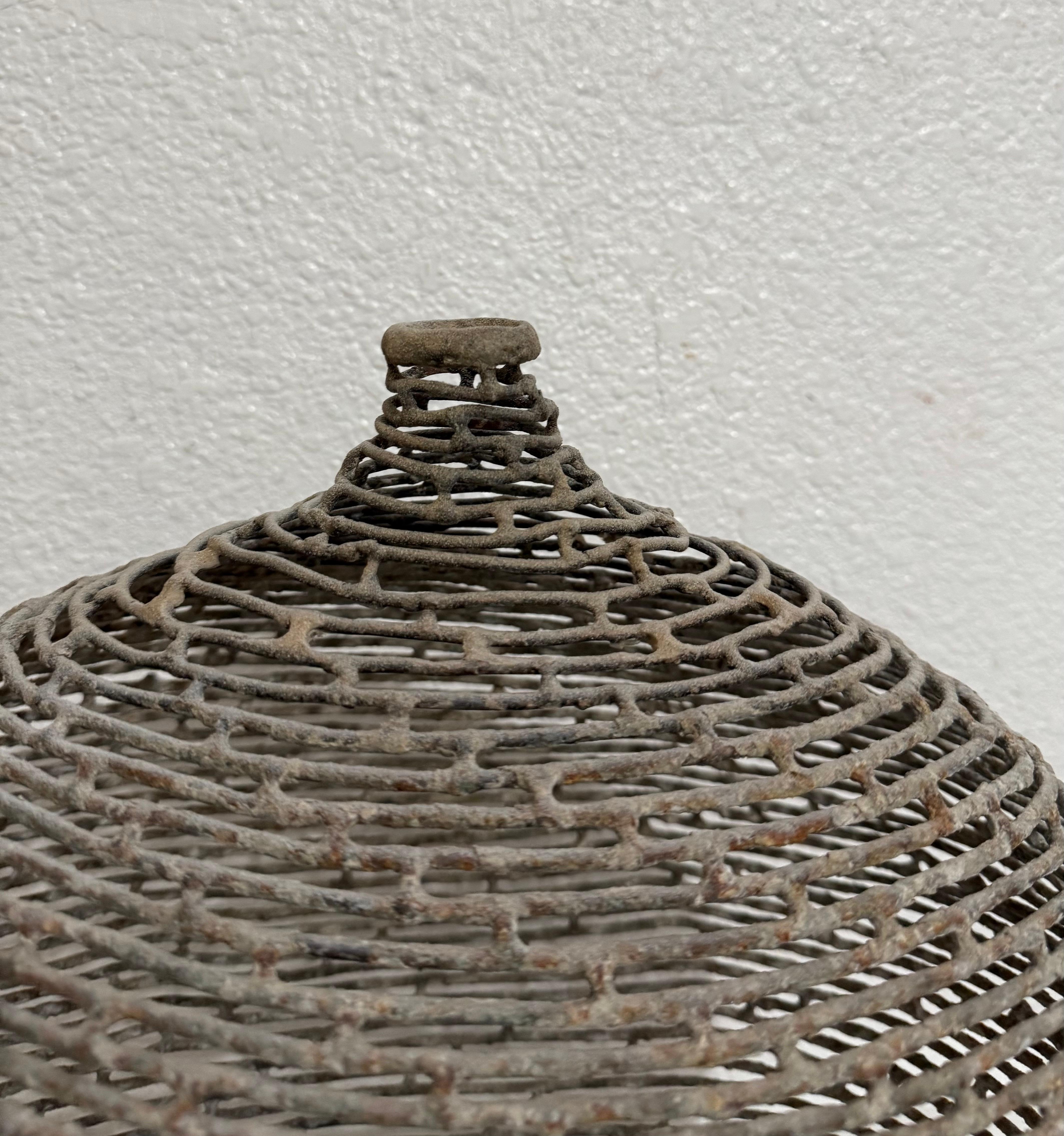 Great studio piece. It does not appear to be signed. 
Welded bronze
an openwork vessel or vase
Verdigris patina, might be suitable for outdoors
Dimensions: 18 X 16 X 9 inches
Provenance: La Jolla California gallery

In the vein of great studio