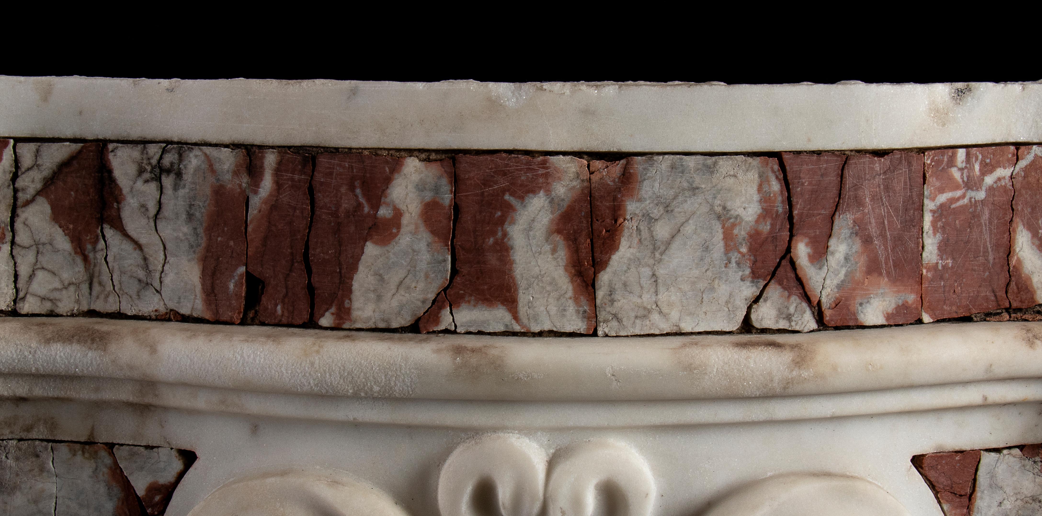 An Italian antique white statuary marble inlaid with ancient and specimen ancient Red and Cipollino  marble, Tabernacle. The high relief Sculpture present a rich and proportionated design with an extraordinary decoration with a three orders scheme.