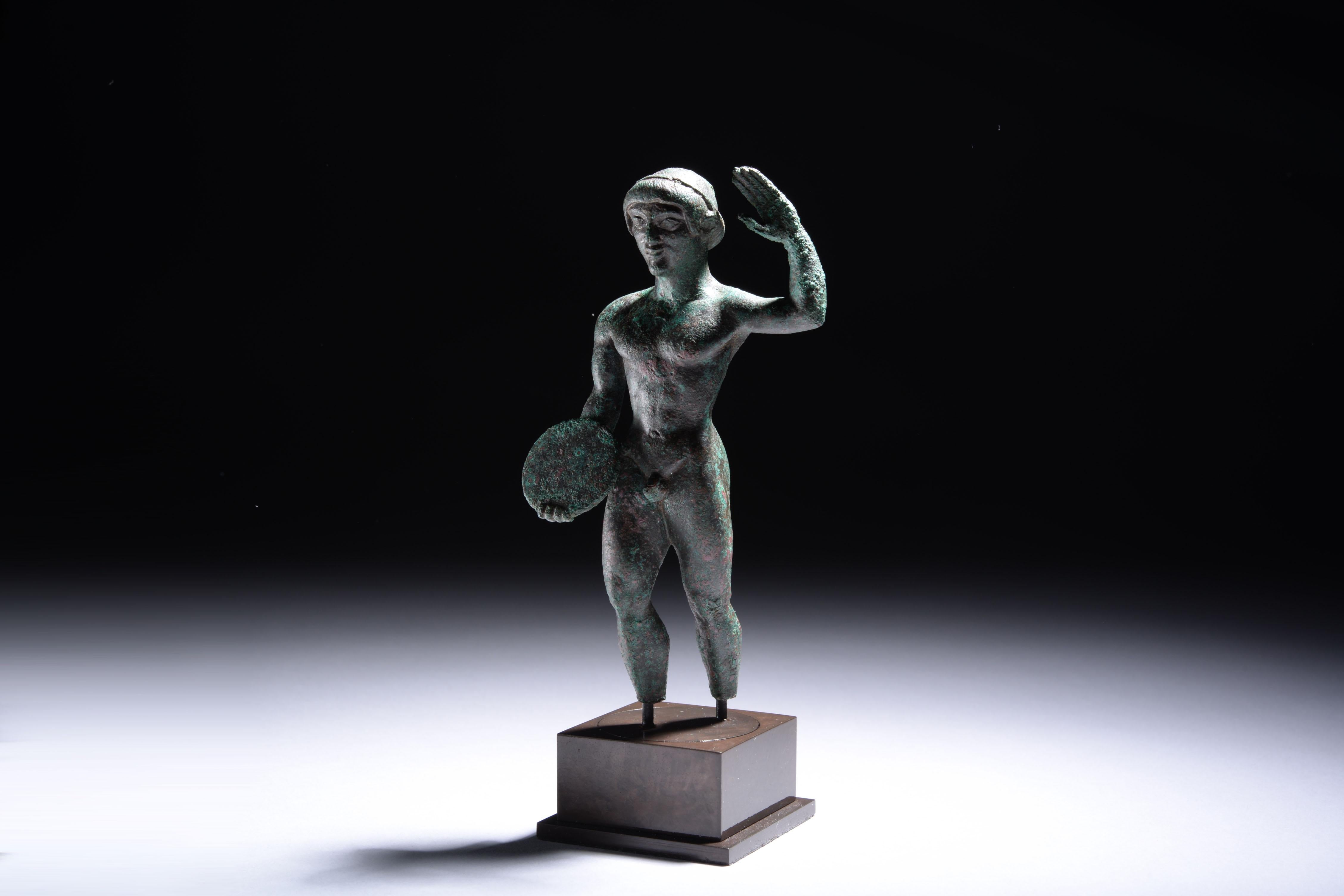 Ancient Etruscan Archaic Bronze Discus Thrower - Gold Nude Sculpture by Unknown