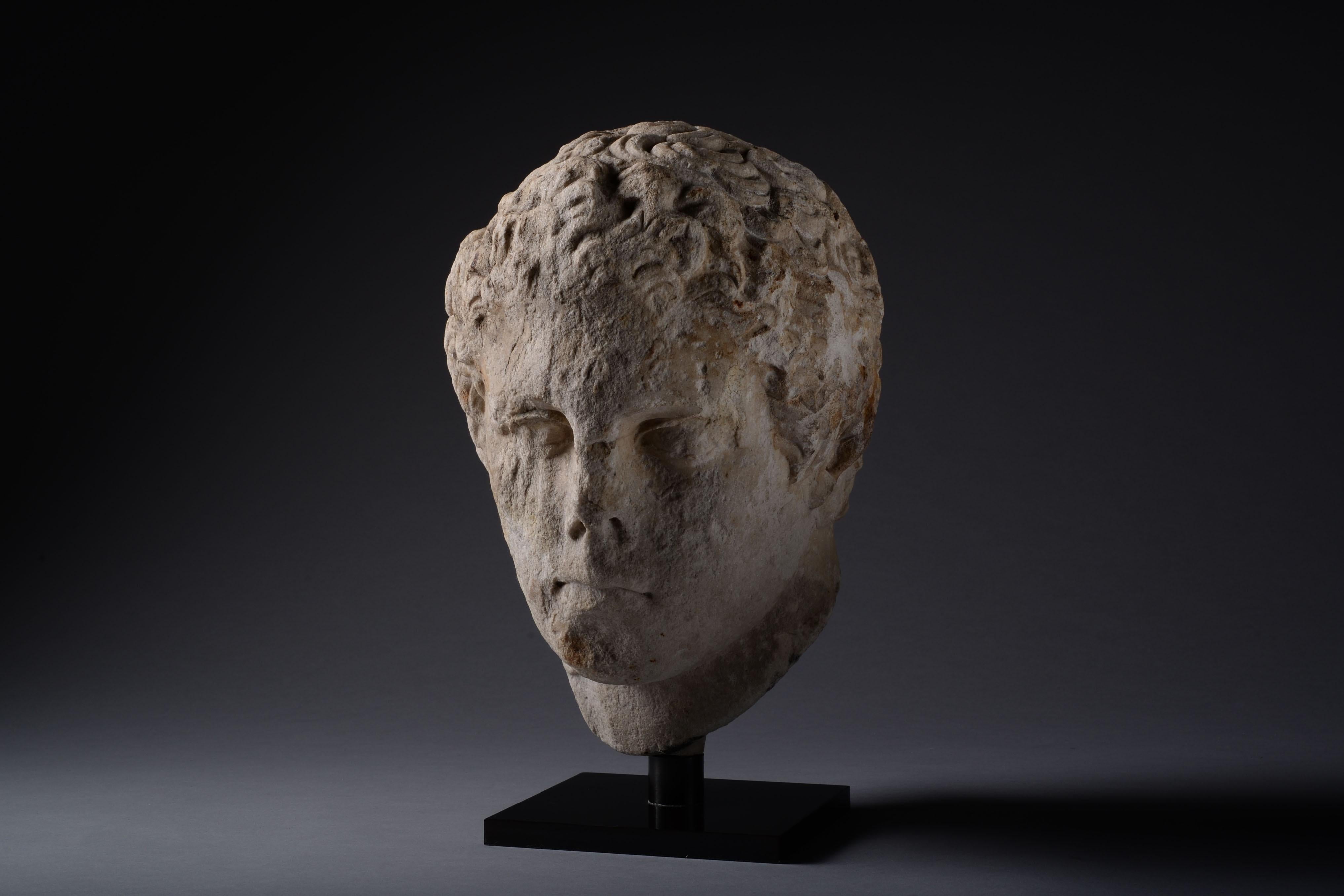 This powerful piece of Hellenistic sculpture is full of pathos. It depicts the idealised head of an athlete, with hair arranged in short locks around a broad forehead and expressive, deeply set eyes.

Athletic prowess was highly valued by the