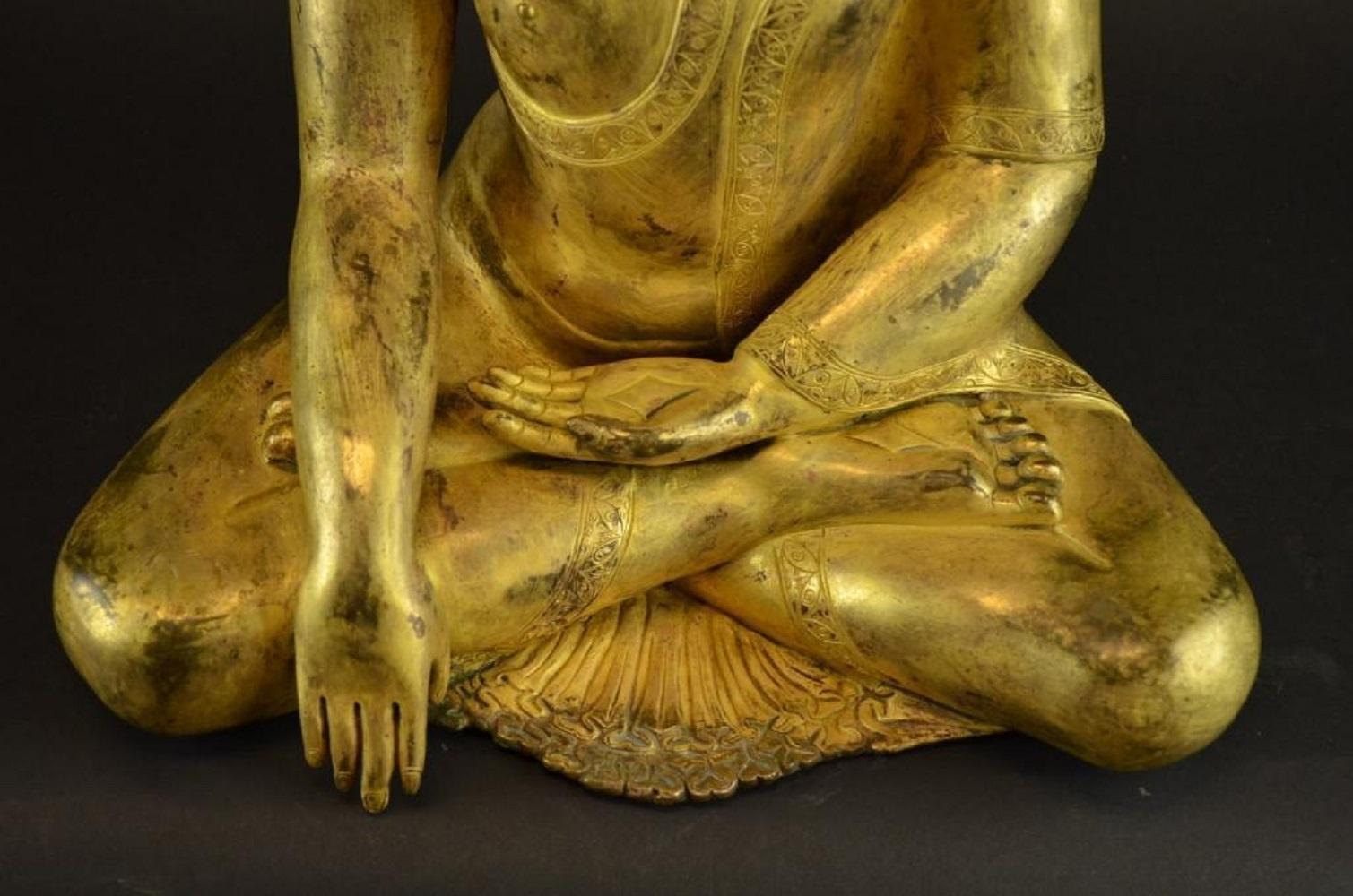 Antique Tibetan Gilt Bronze Seated Buddha - Other Art Style Sculpture by Unknown