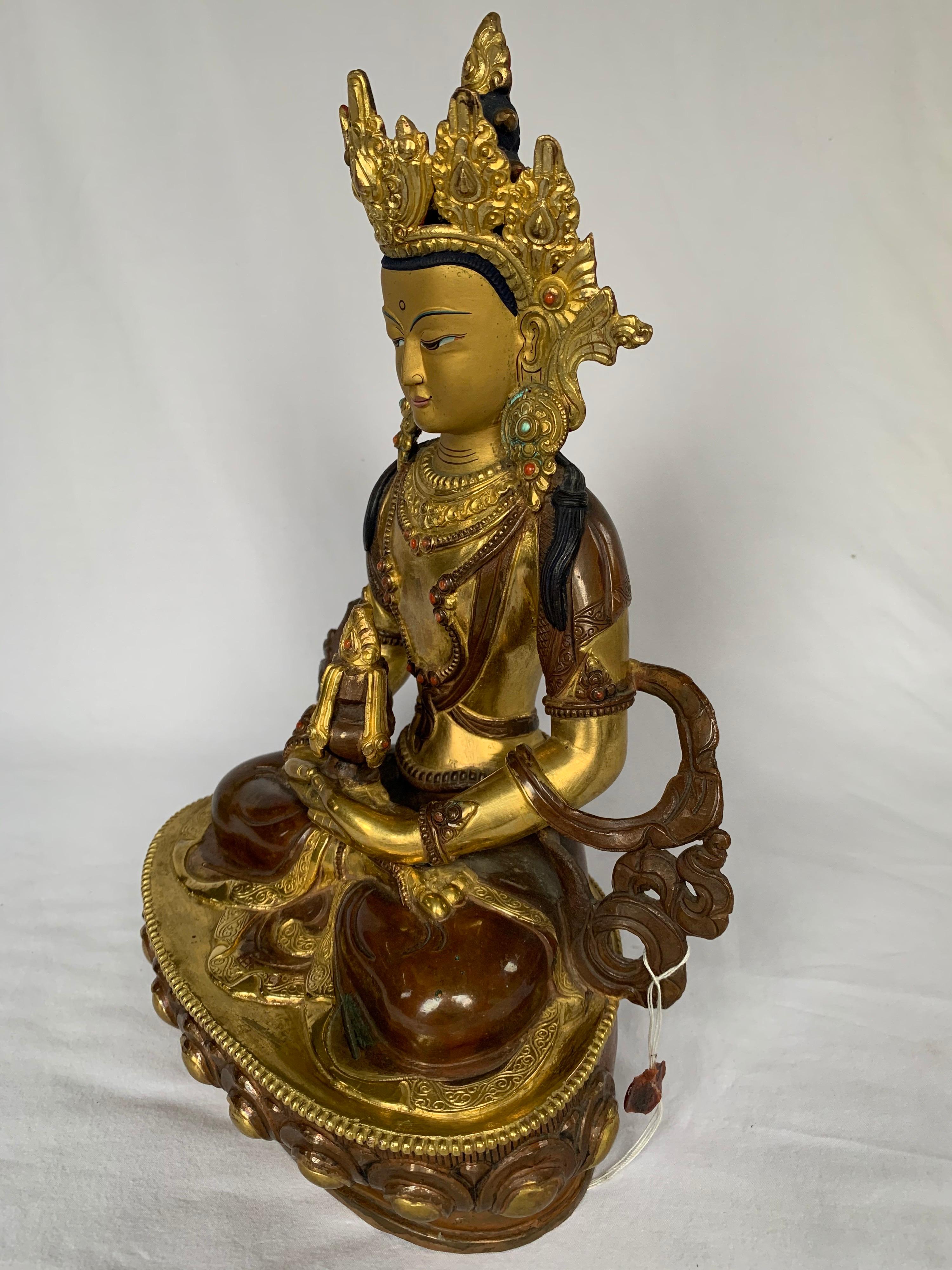 This statue is handcrafted by lost wax process which is one of the ancient process of metal craft. Aparmita is seated in 