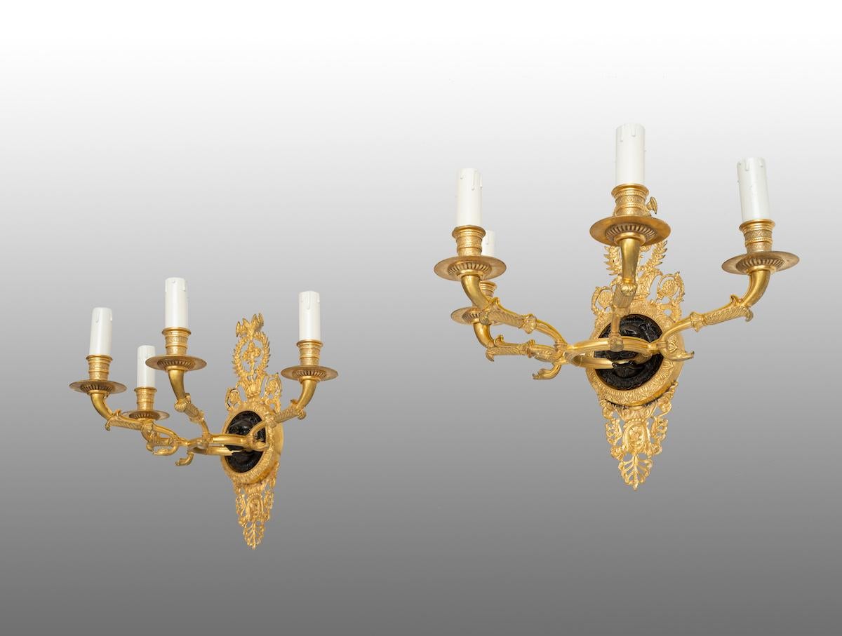 Antique French Empire gilt bronze and patinated bronze wall sconce. 19th Century - Sculpture by Unknown