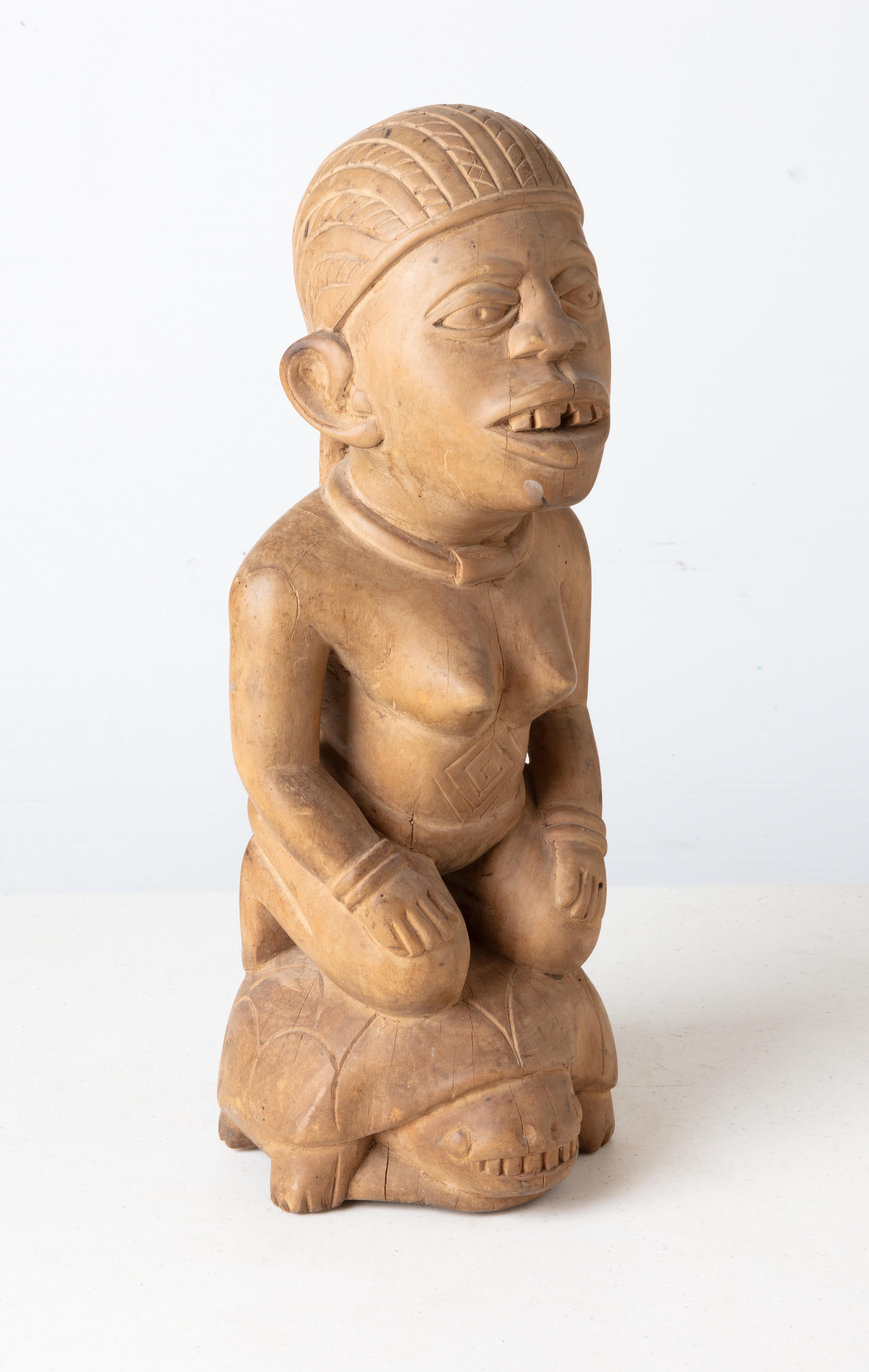 Unknown Figurative Sculpture - Bacongo Queen on Turtle (Ruler of the Tribe)-Zaire