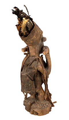 "Bacongo Statue, Used as Fetish - Zaire, " Wood, Glass Feathers, & Cloth