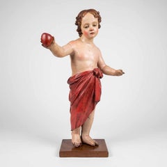 „Bambin Gesù con Cuore“ (Kind Jesus mit Herz) – Italienische Barock-Holzskulptur aus dem 17. Jahrhundert, lackiert