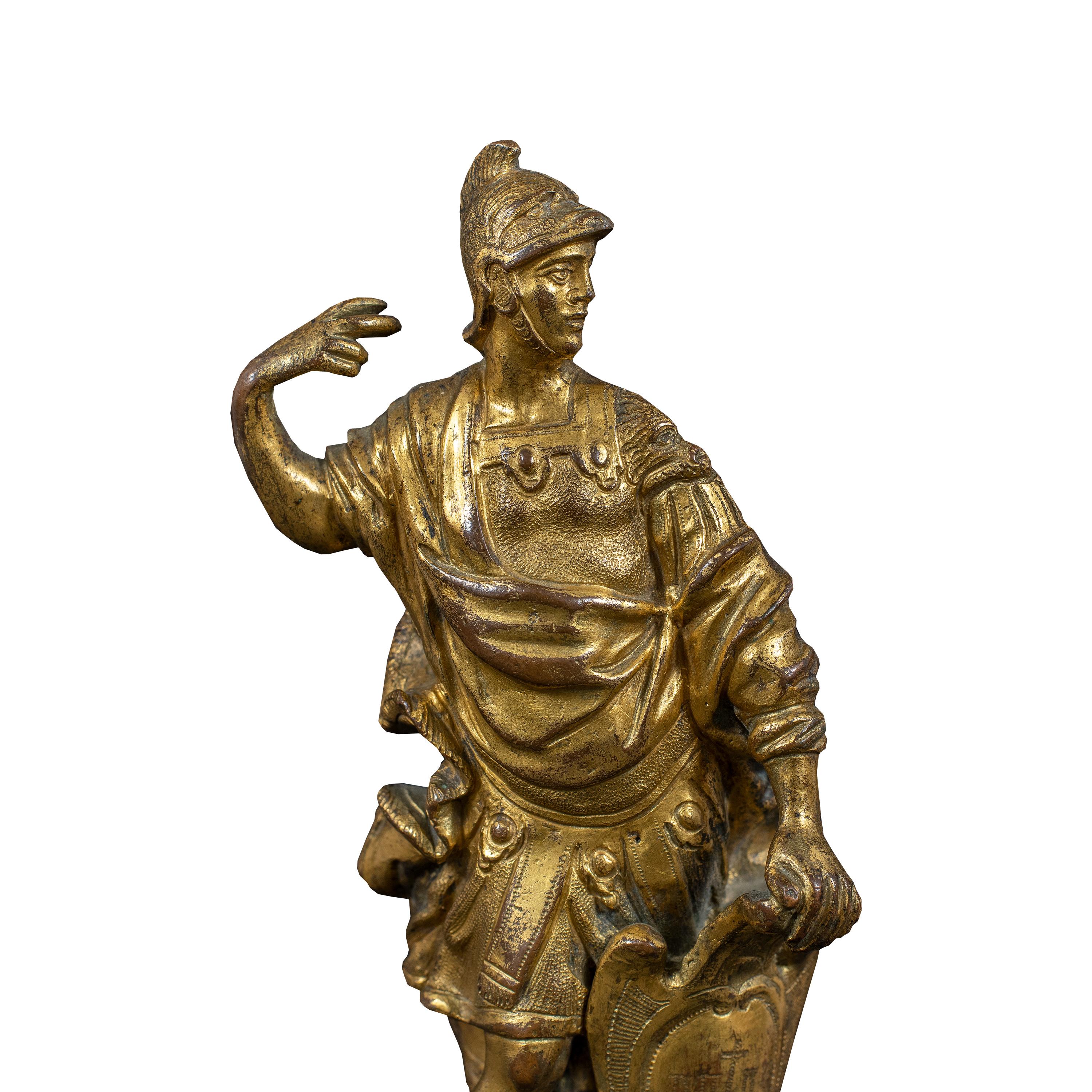 Gilded bronze sculpture - Mars, god of War. Rome, 17th century.

9 x 9 x h 31 cm.

Entirely in cast, chiseled and gilded bronze, resting on an ebonized wooden pedestal decorated with four gilded bronze plaques depicting cherubs and festoons. Base in