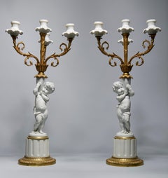 Bisque Porcelain and Gilt Candelabras w/ Putti