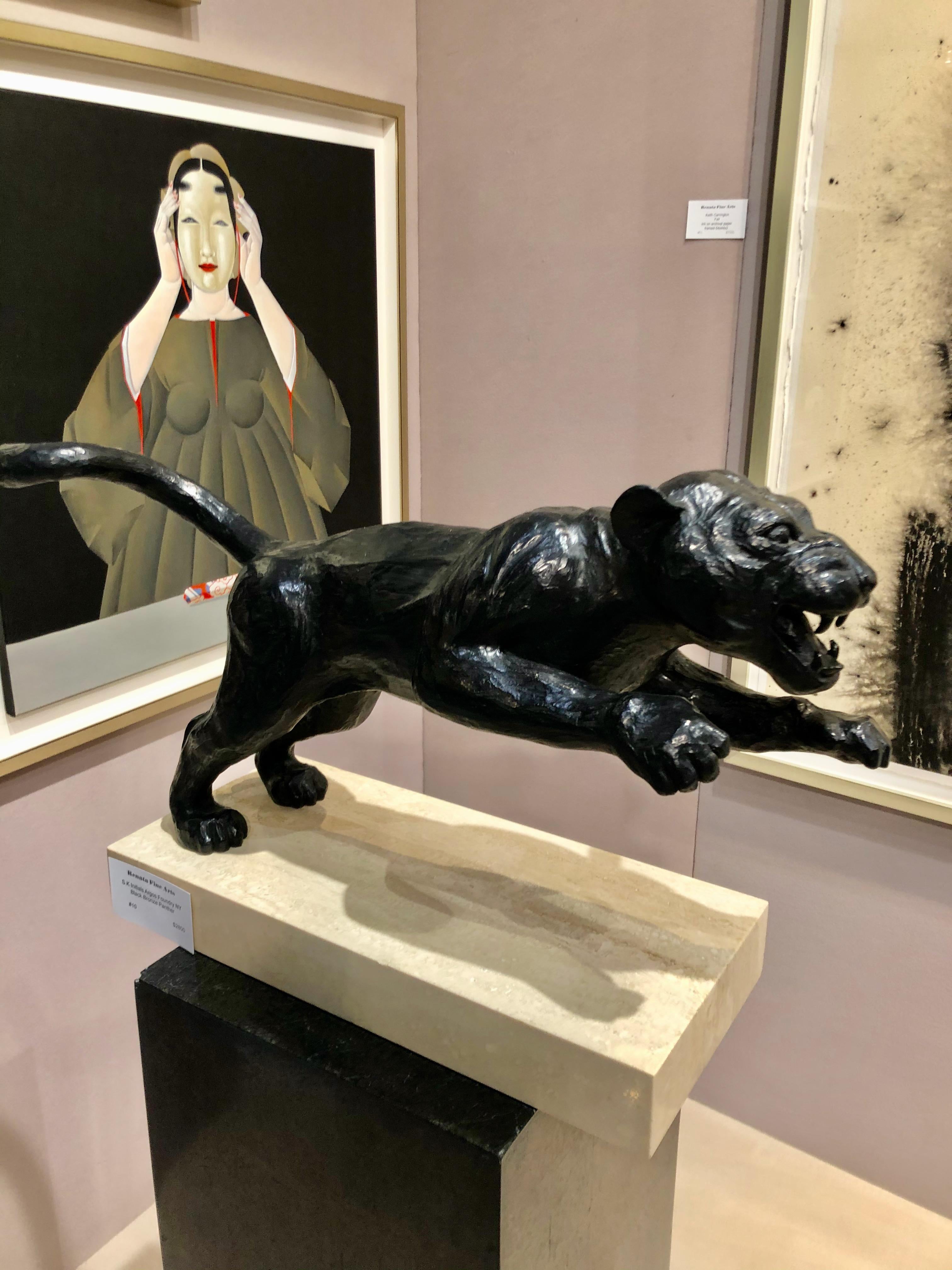  Panther Bronze Sculpture with black patina, signed with initials S. K. Argos Foundry on beige travertine stone.
Wonderful quality casting Modern bronze sculpture, Argos Foundry was established in the 1980s in Brewster NY.