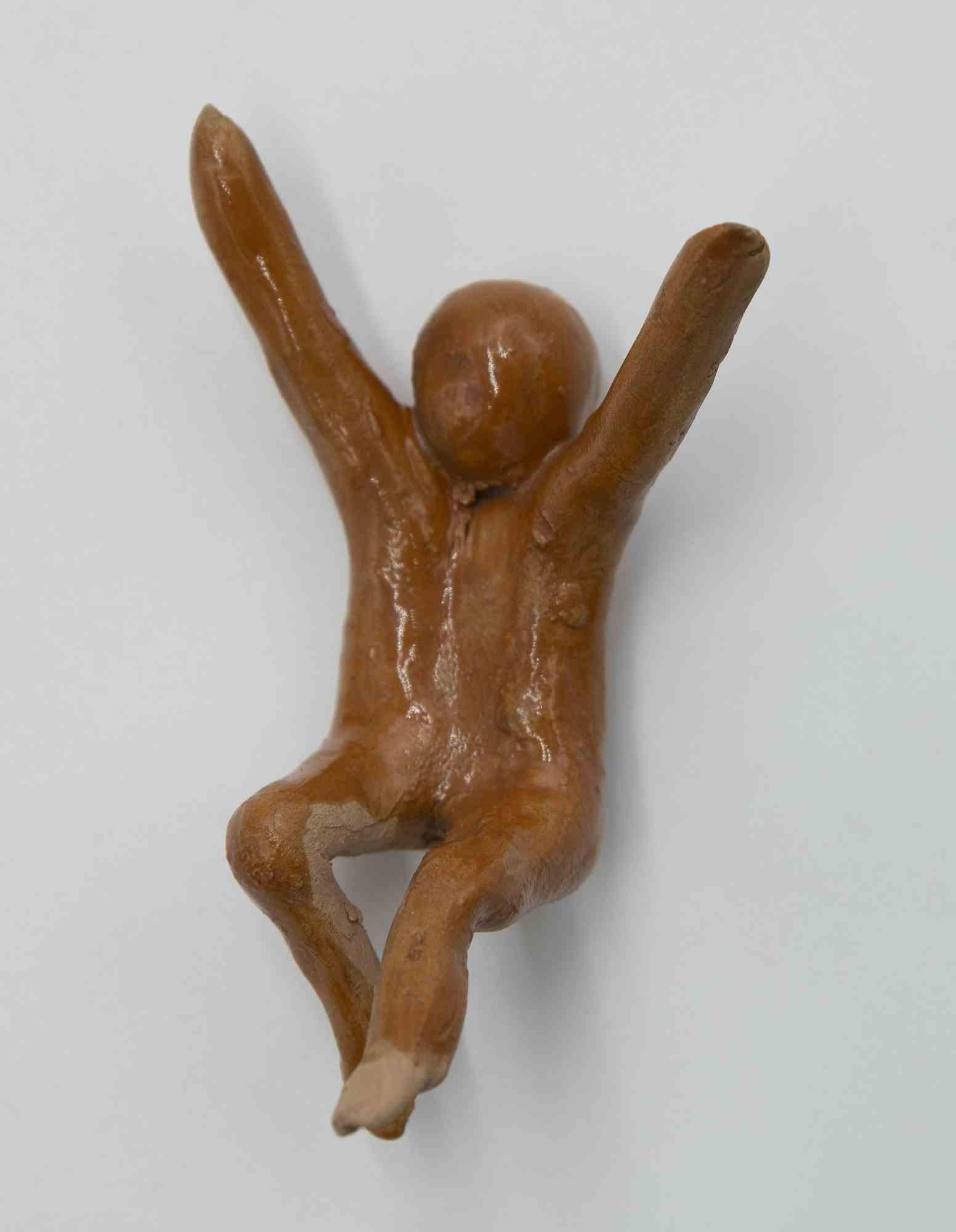 miniature figurative carvings