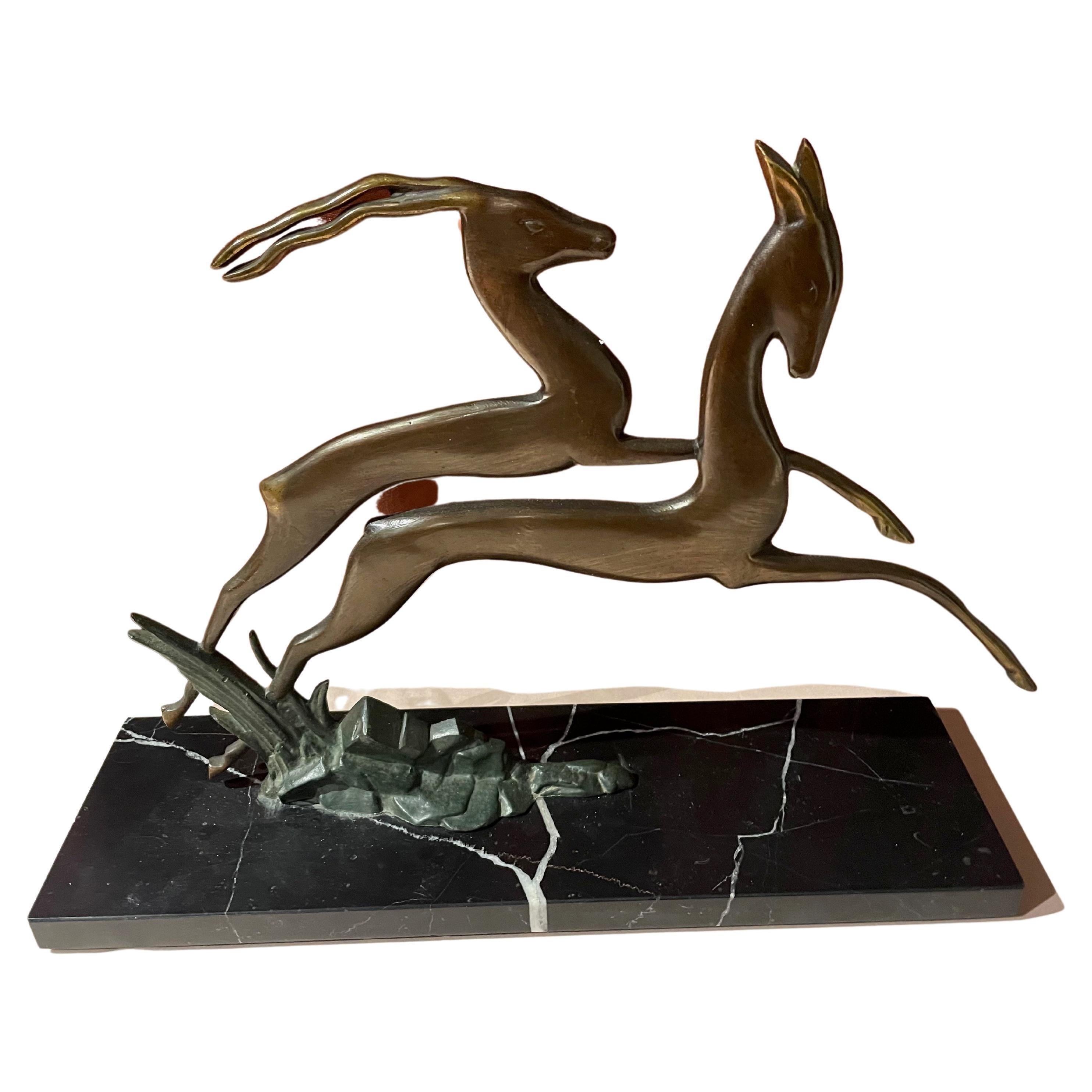 Unknown Figurative Sculpture – Bronze Art Deco Paar der springenden Gazelle auf Marmorsockel