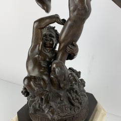 Bronze of a Dancing Bacchus with a child Faun