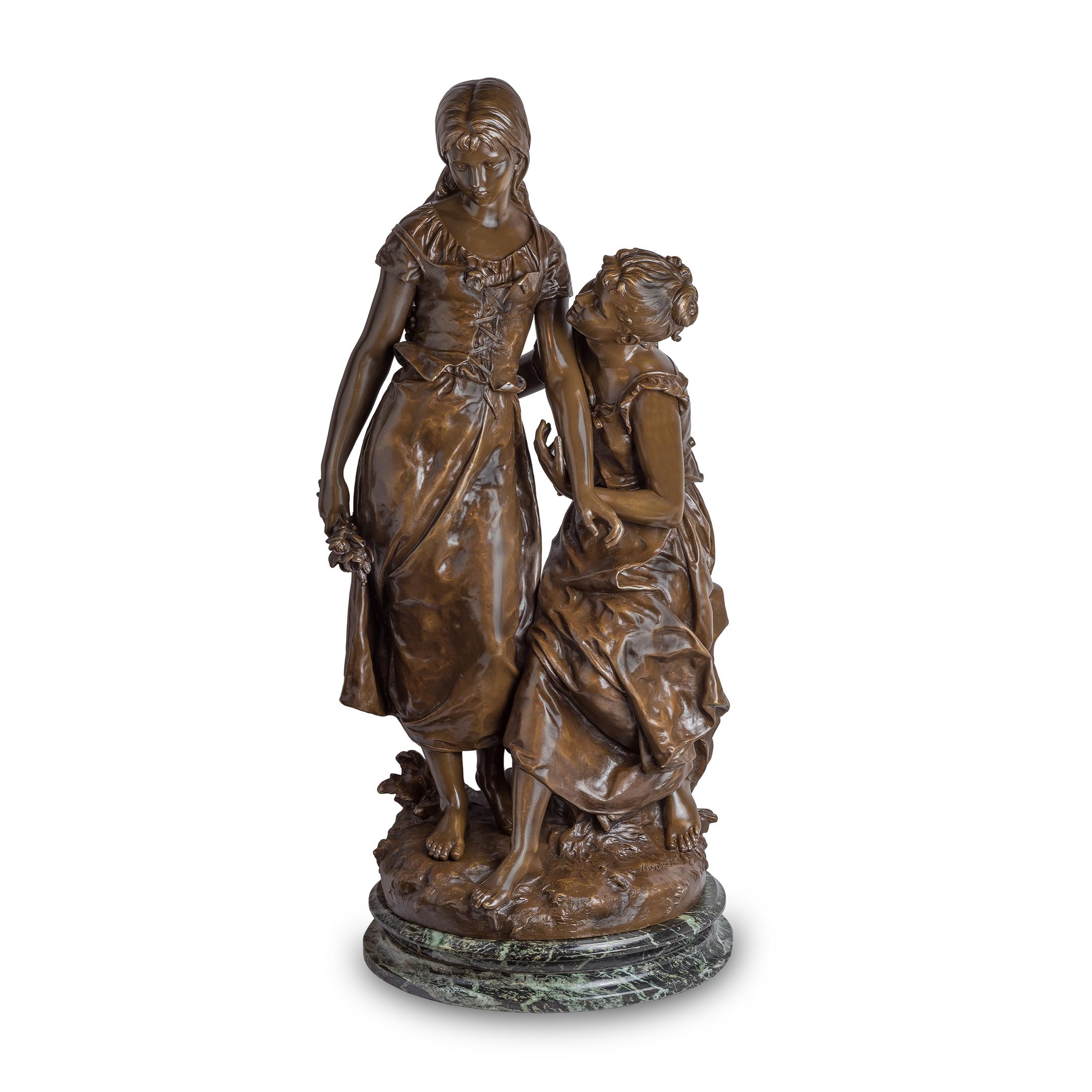 Scultura in bronzo di due bellezze