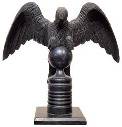 Carved and Ebonized Statue of an Eagle