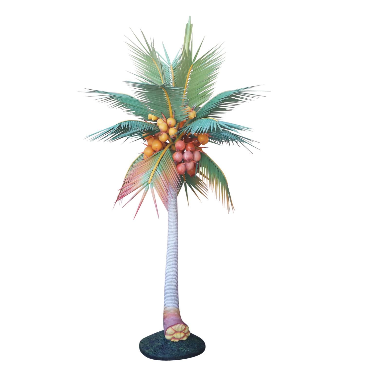 Extraordinary tall vintage palm tree sculpture handcrafted in wood carved and paint decorated with leaves, coconuts, trunk, and weighted terra firma base.