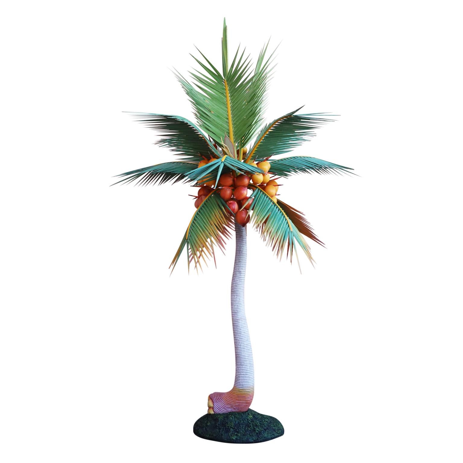 Extraordinary tall vintage palm tree sculpture handcrafted in wood carved and paint decorated with leaves, coconuts, trunk, and weighted terra firma base.