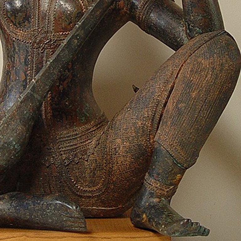 Il s'agit d'un musicien de cérémonie du temple de Chiang Mai en Thaïlande.