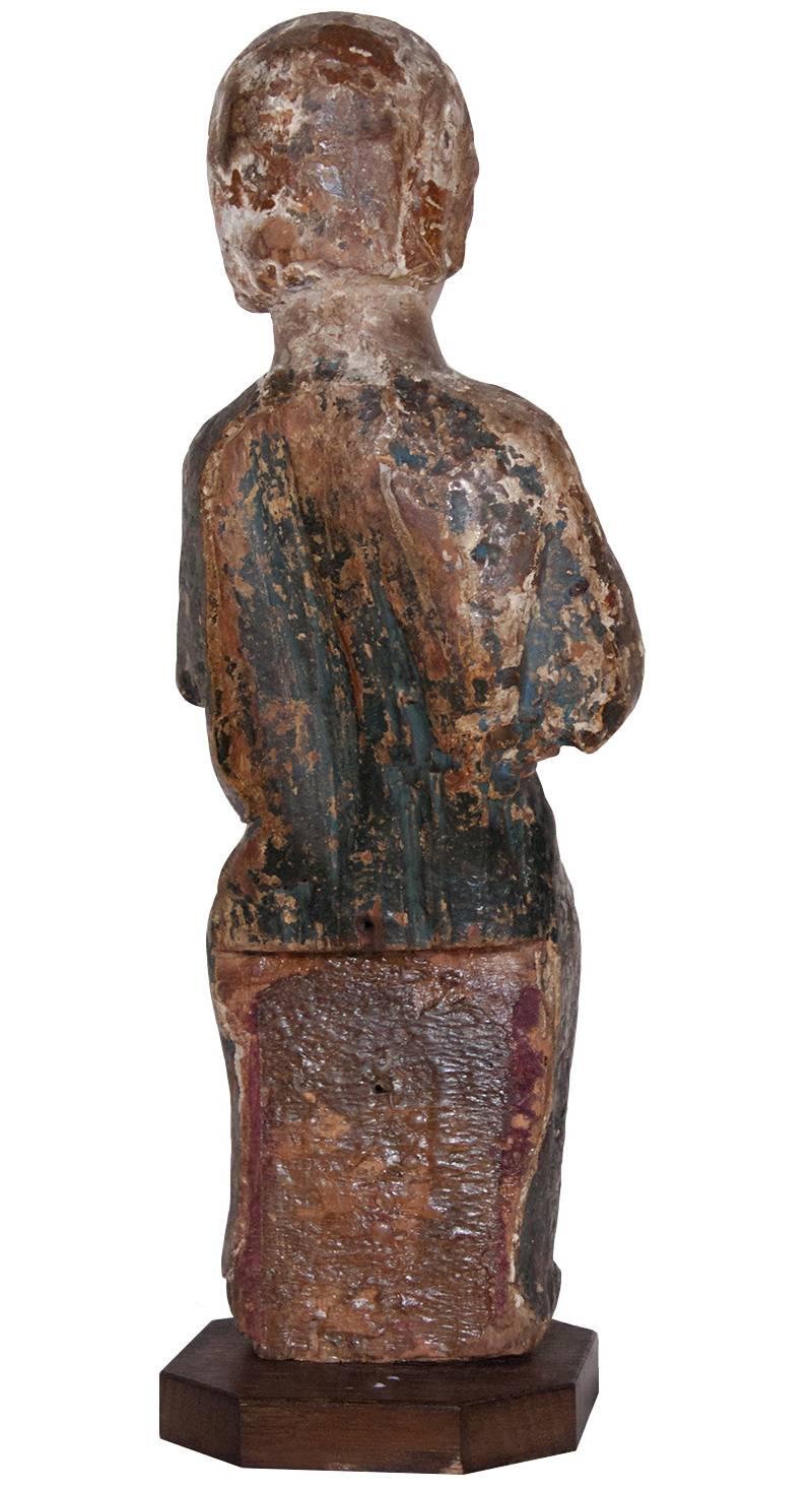 Child Jesus in painted and gilt wood, 13th century - Medieval Sculpture by Unknown