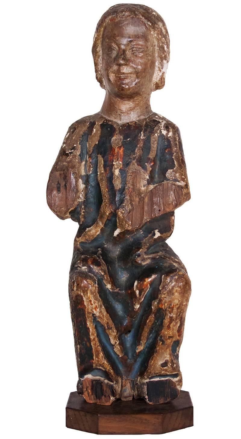 Unknown Figurative Sculpture - Child Jesus in painted and gilt wood, 13th century