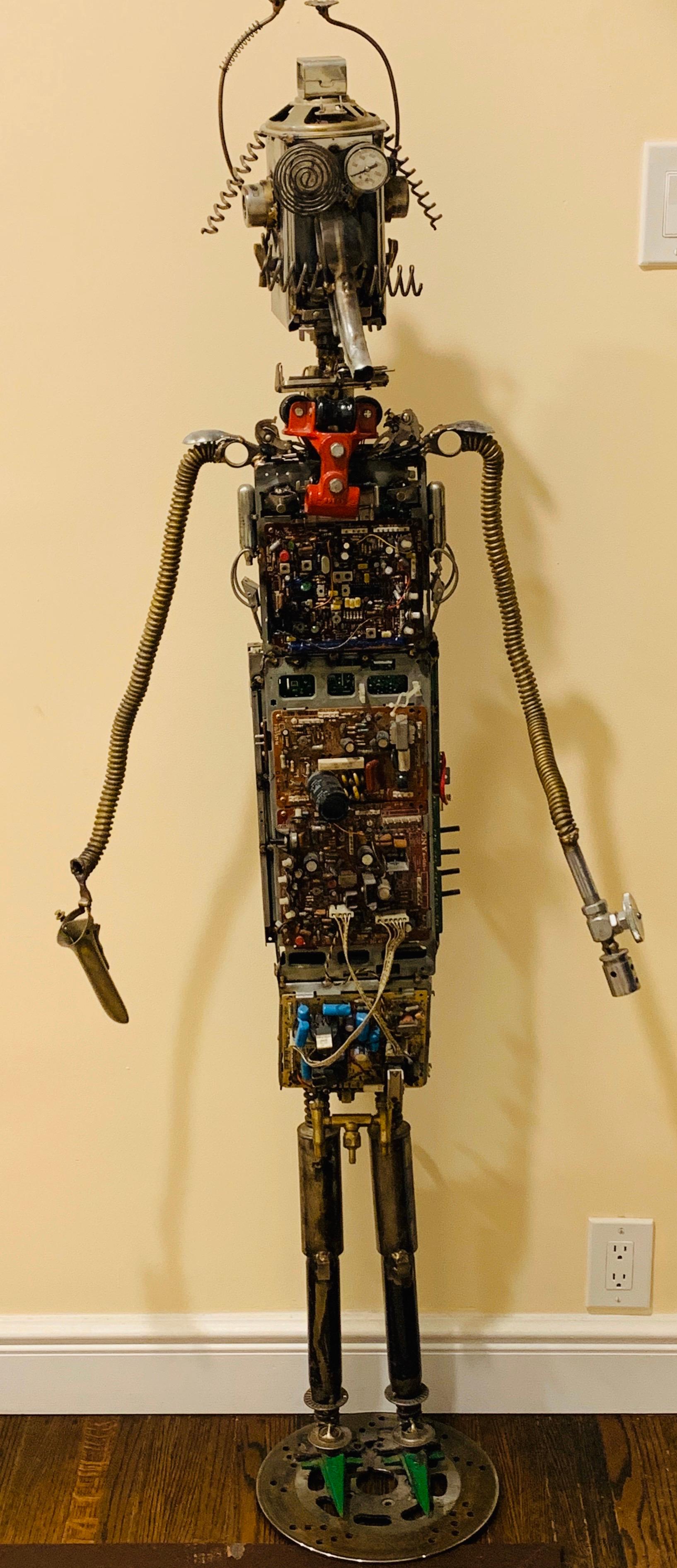 Sculpture created primarily from circuit boards with coils, tubes and plumbing fixtures.
He is quite a handsome guy!