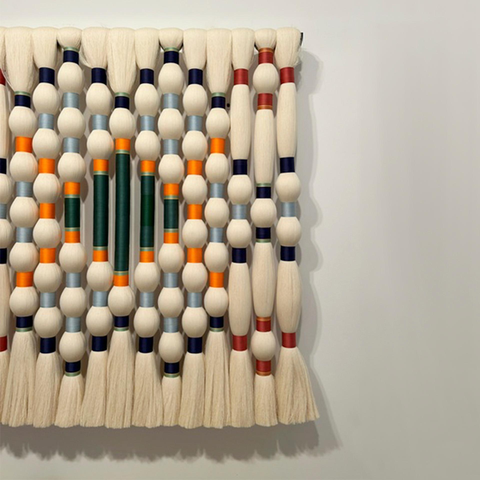 Large-format artisan wall-hanging, meticulously handmade from 100% raw cotton thread derived from the agave plant, featuring natural dyed details. This textile piece offers a contemporary reinterpretation of traditional geometric motifs inspired by