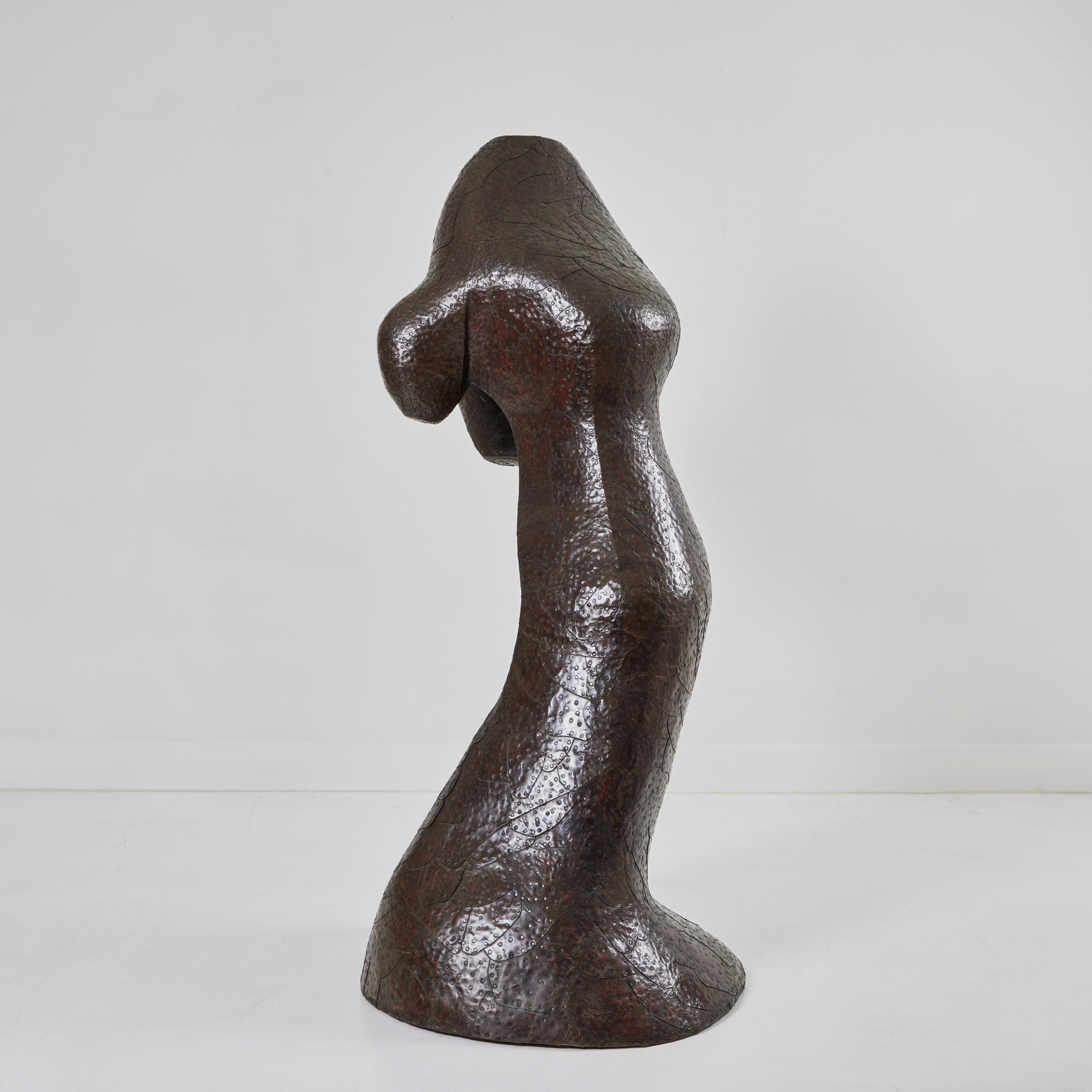 As part of his Copper Clad Cedar Collection, this one of a kind Biomorphic form by Bill Anson is a wonderful example of his mixed media work utilizing cedar and copper. The sculpture is made with a large piece of cedar that was shaped then wrapped
