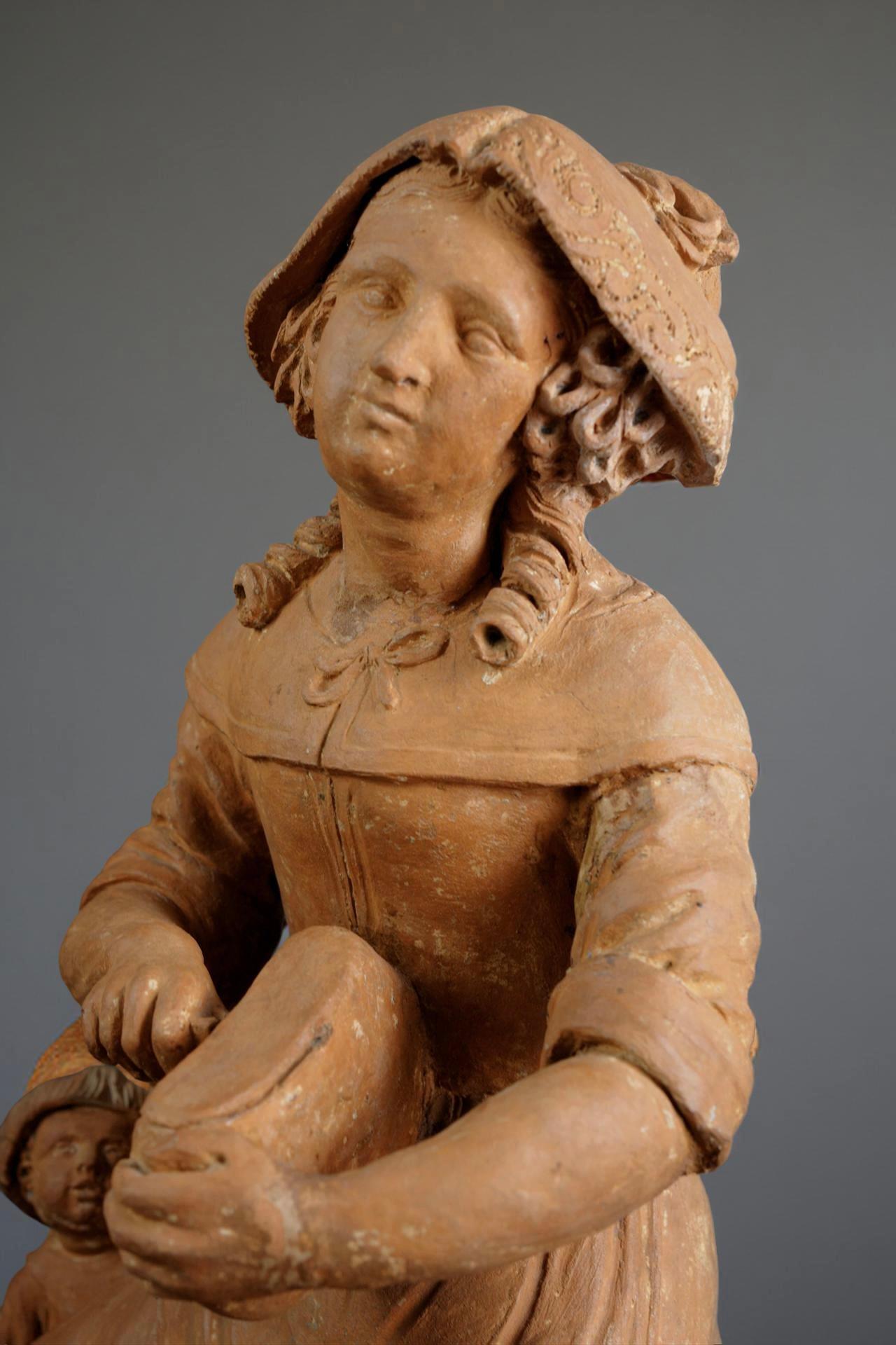 Coppia di grandi sculture in terracotta raffiguranti una scena con due paesani, Francia, bottega parigina, seconda metà del XVII secolo.   

Nel XVII secolo, l'Italia, e in misura minore le Fiandre, fecero ampio uso della terracotta nella scultura.