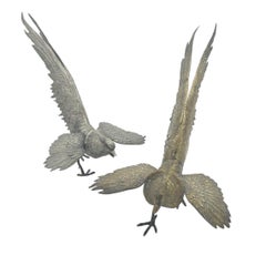 Paire de sculptures en métal représentant des oiseaux mythologiques, France, fin du XIXe siècle
