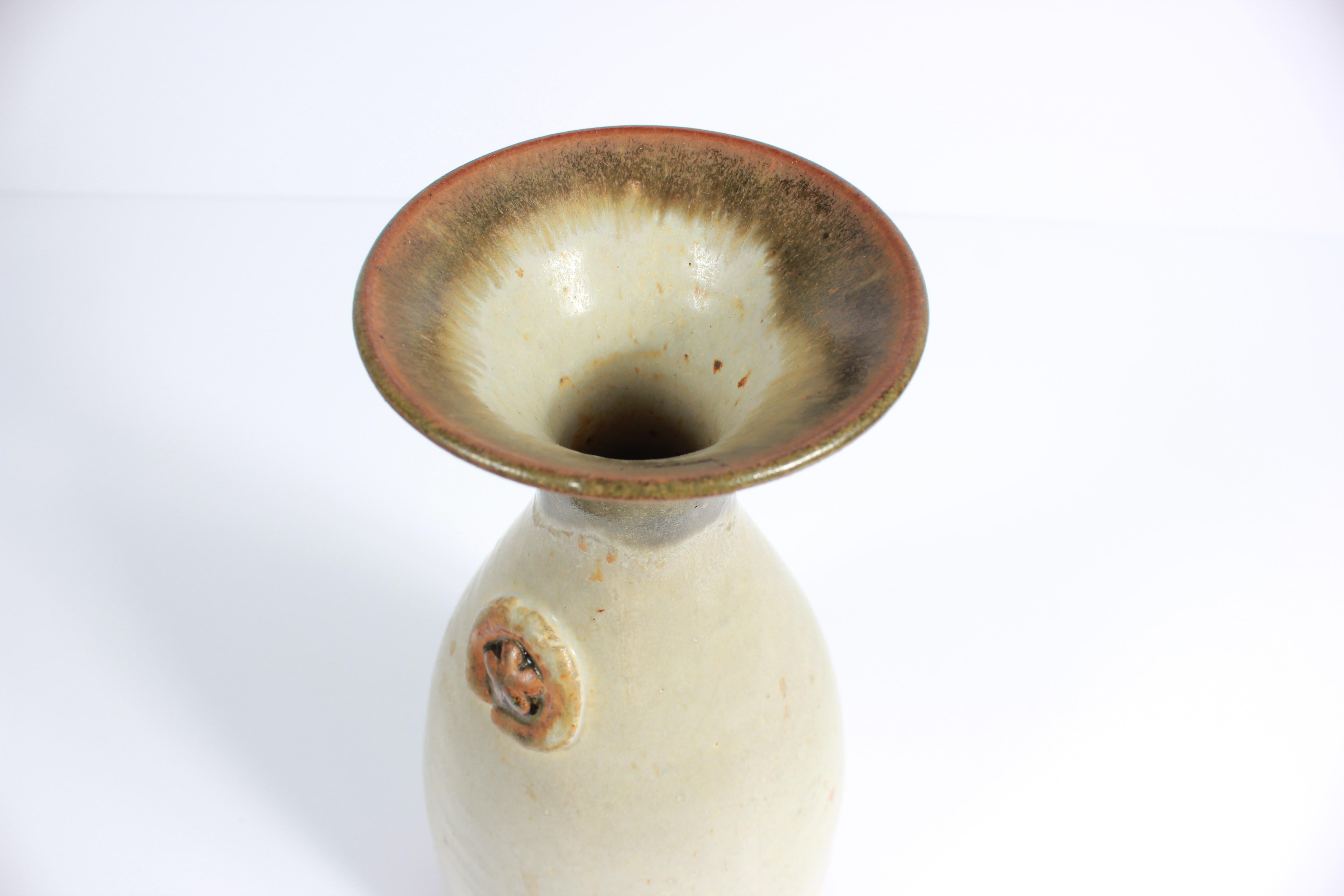 cream stone vase