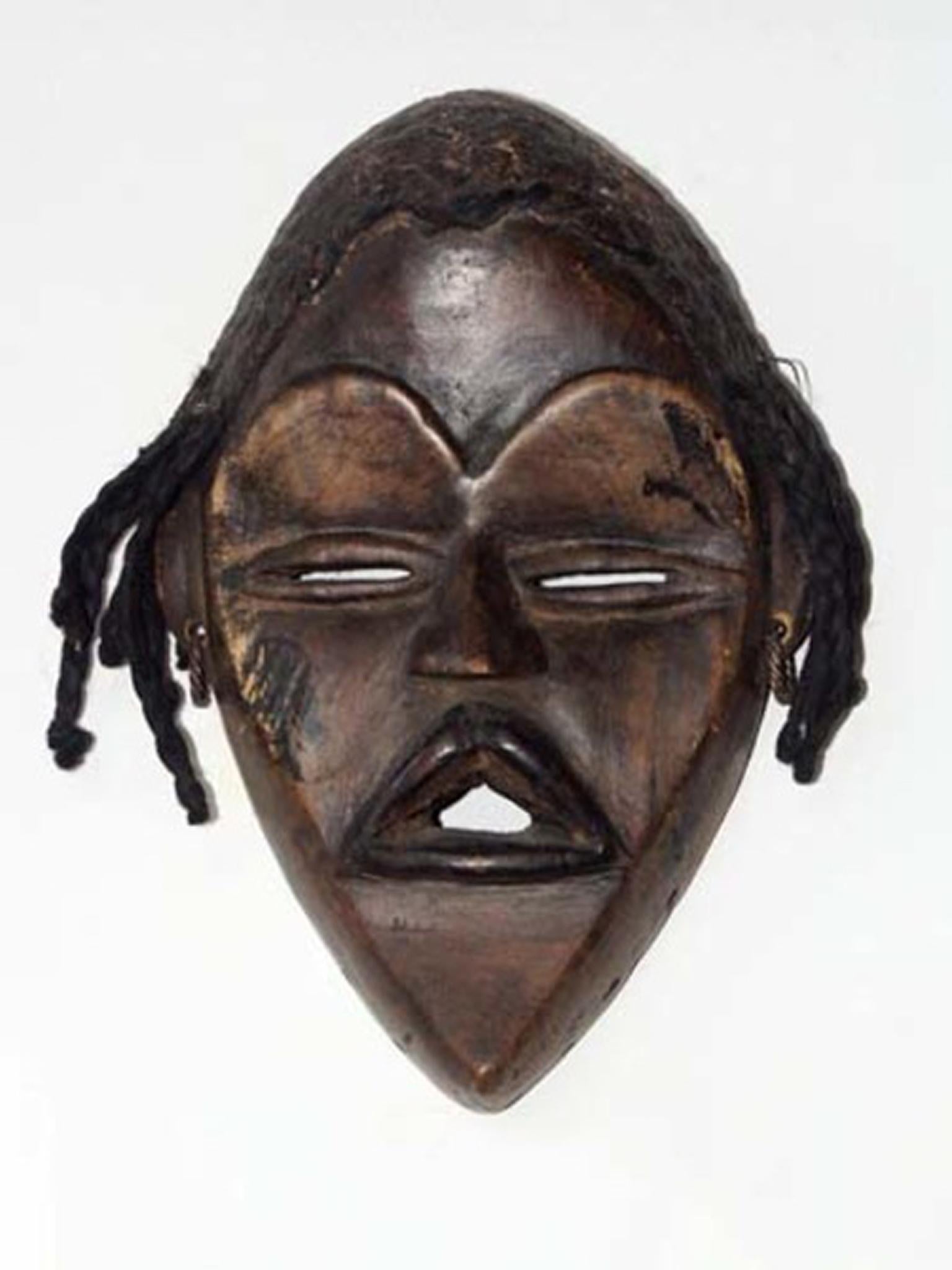 "Dan Mask Ivory Coast, " Wood, Hair, & Mud created in African in c. 1940