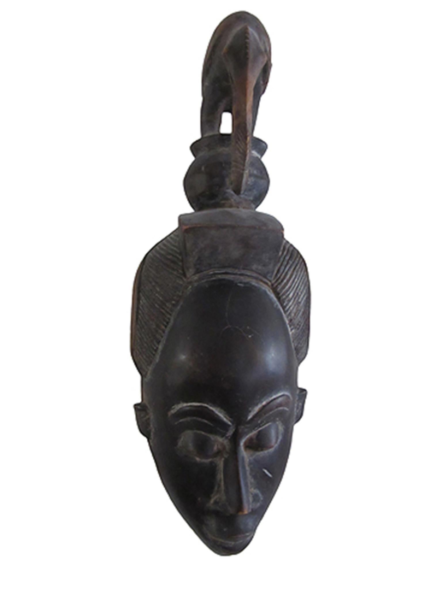 Unknown Figurative Sculpture - "Dance Mask, " Carved Wood created c. 1965