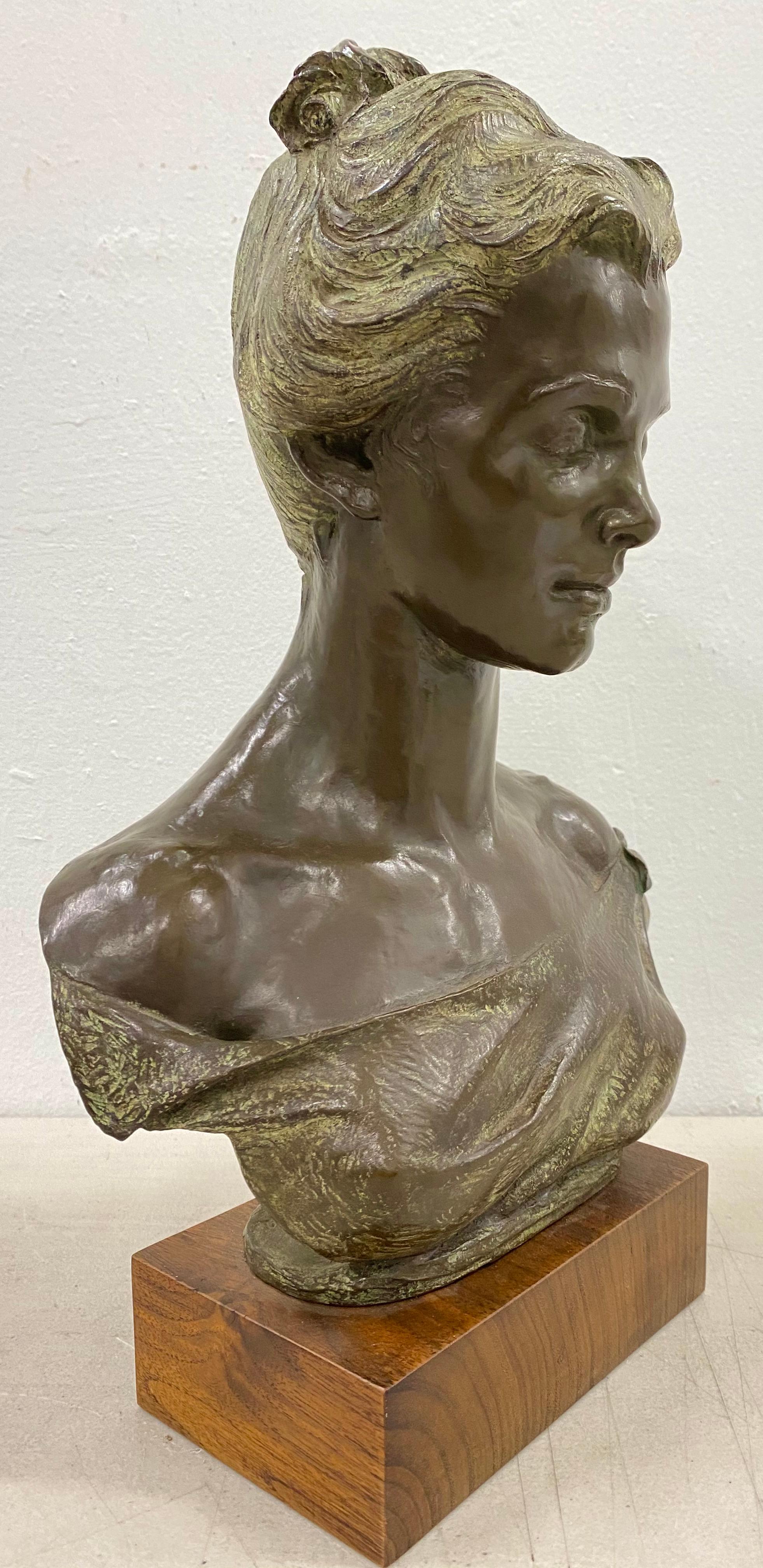 Early 20th Century Bronze Bust of an Elegant Young Woman C.1916 - Sculpture by Unknown