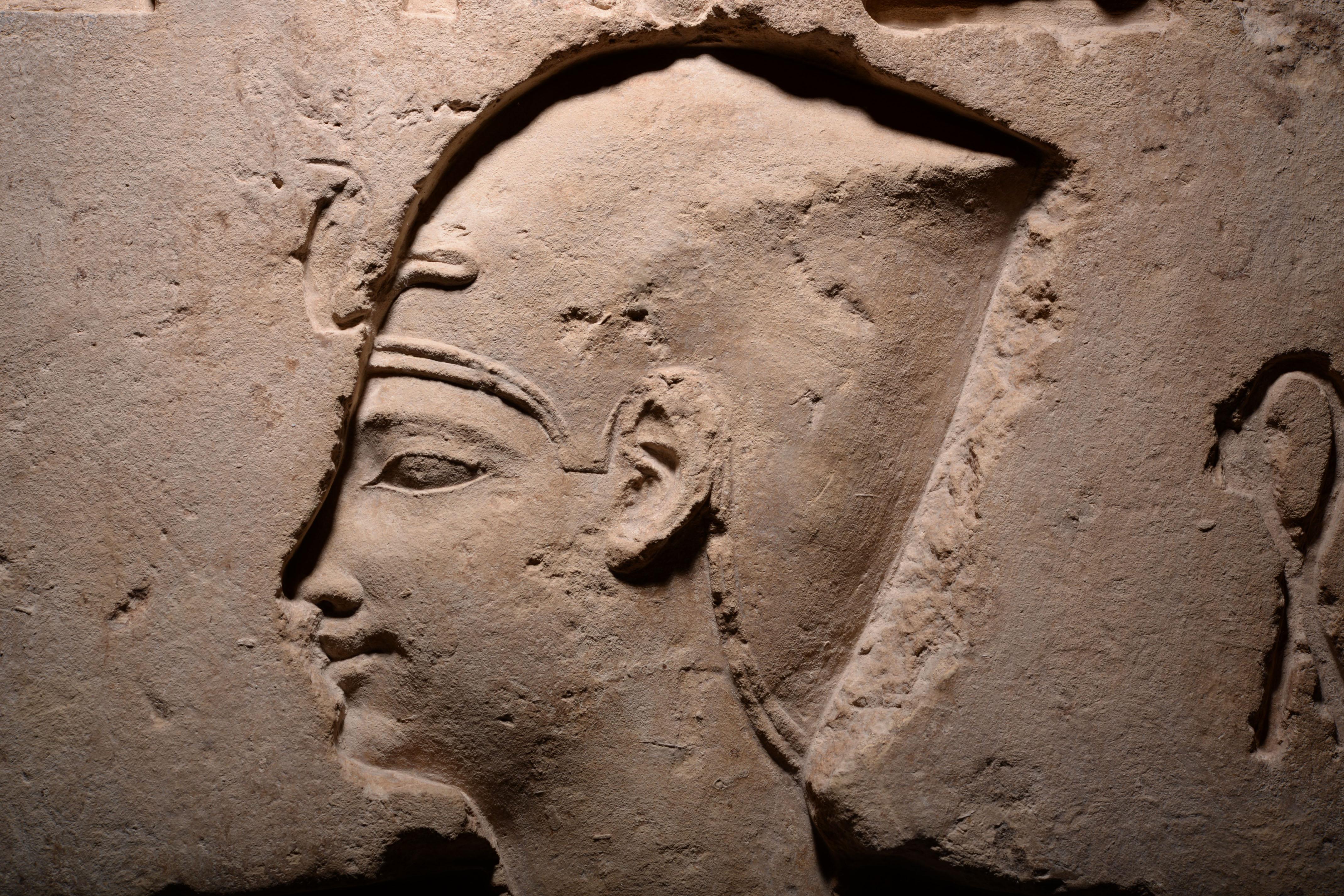 Early Ptolemaic Egyptian Limestone Relief depicting a Pharaoh - Sculpture by Unknown